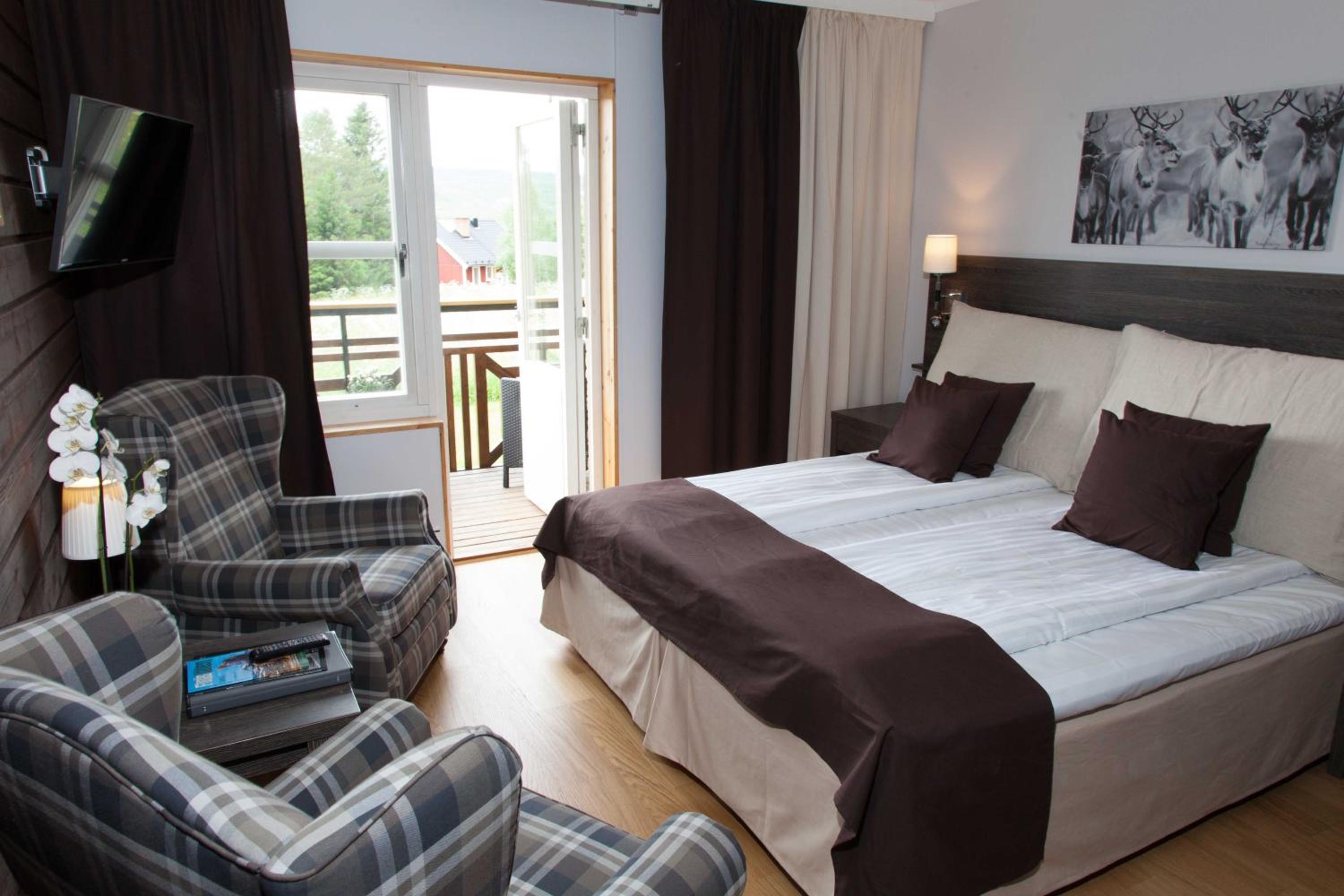 Premium Quadruple Room (2 Adults + 2 Children) - Photo 3