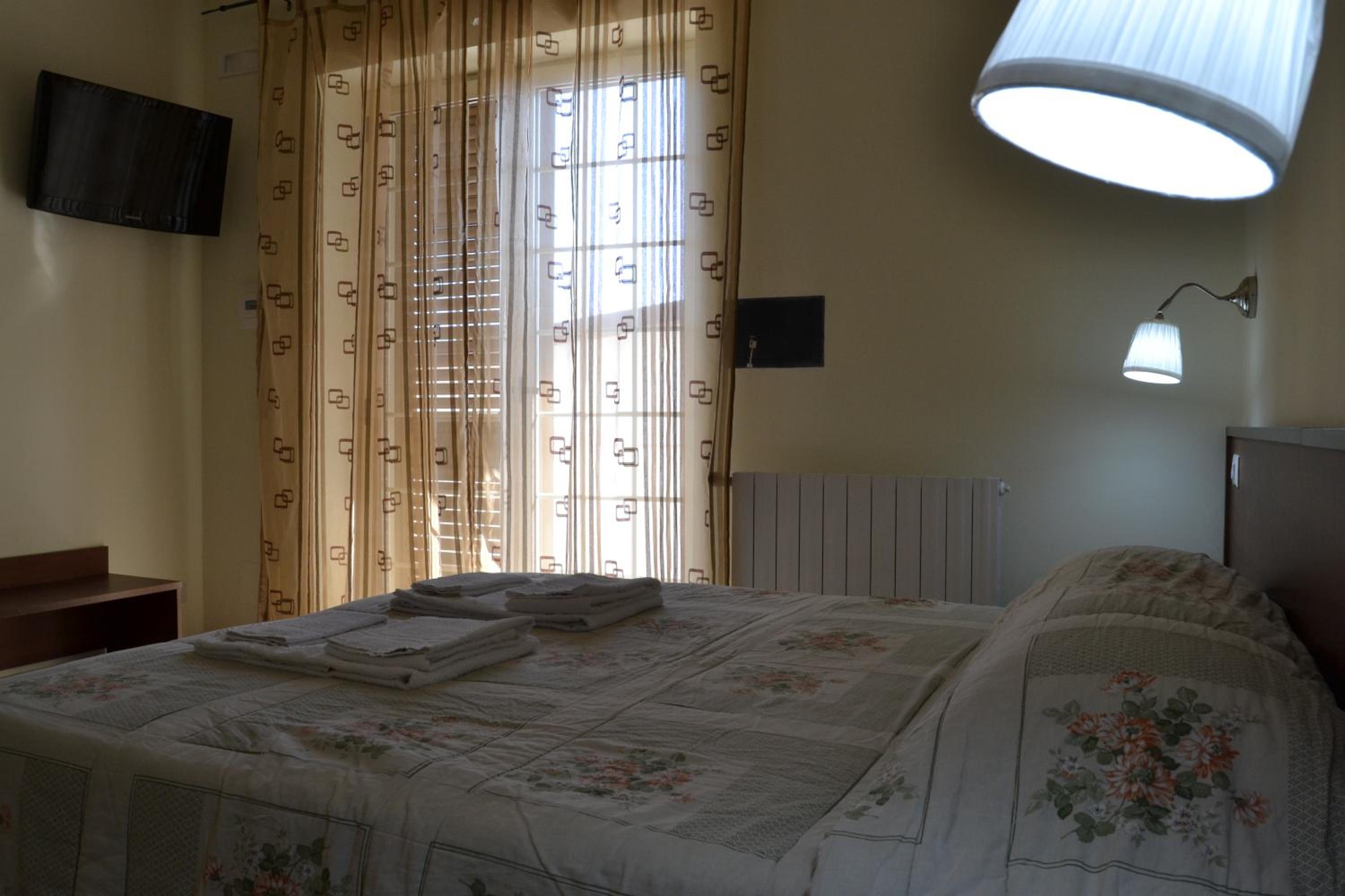 Standard Quadruple Room - Photo 21