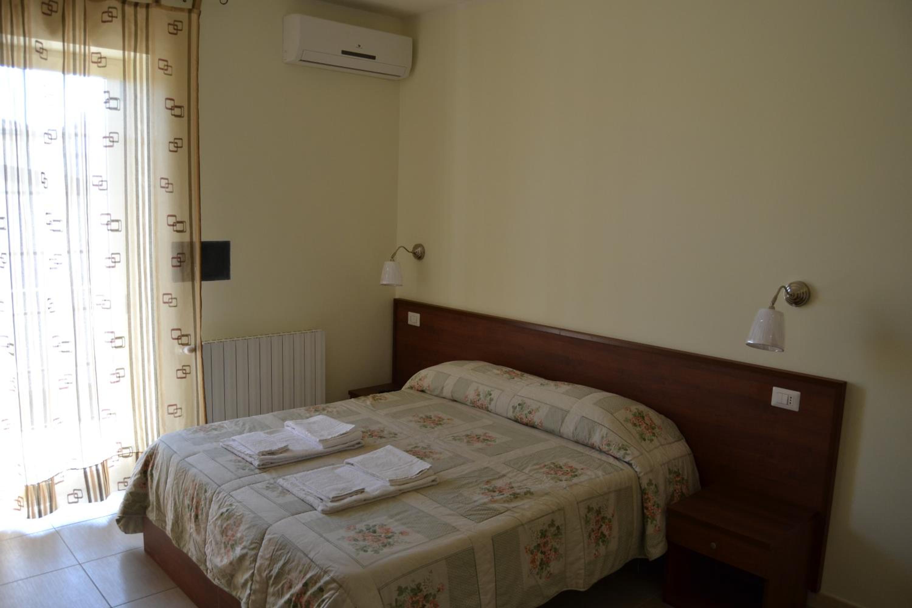 Standard Quadruple Room - Photo 20