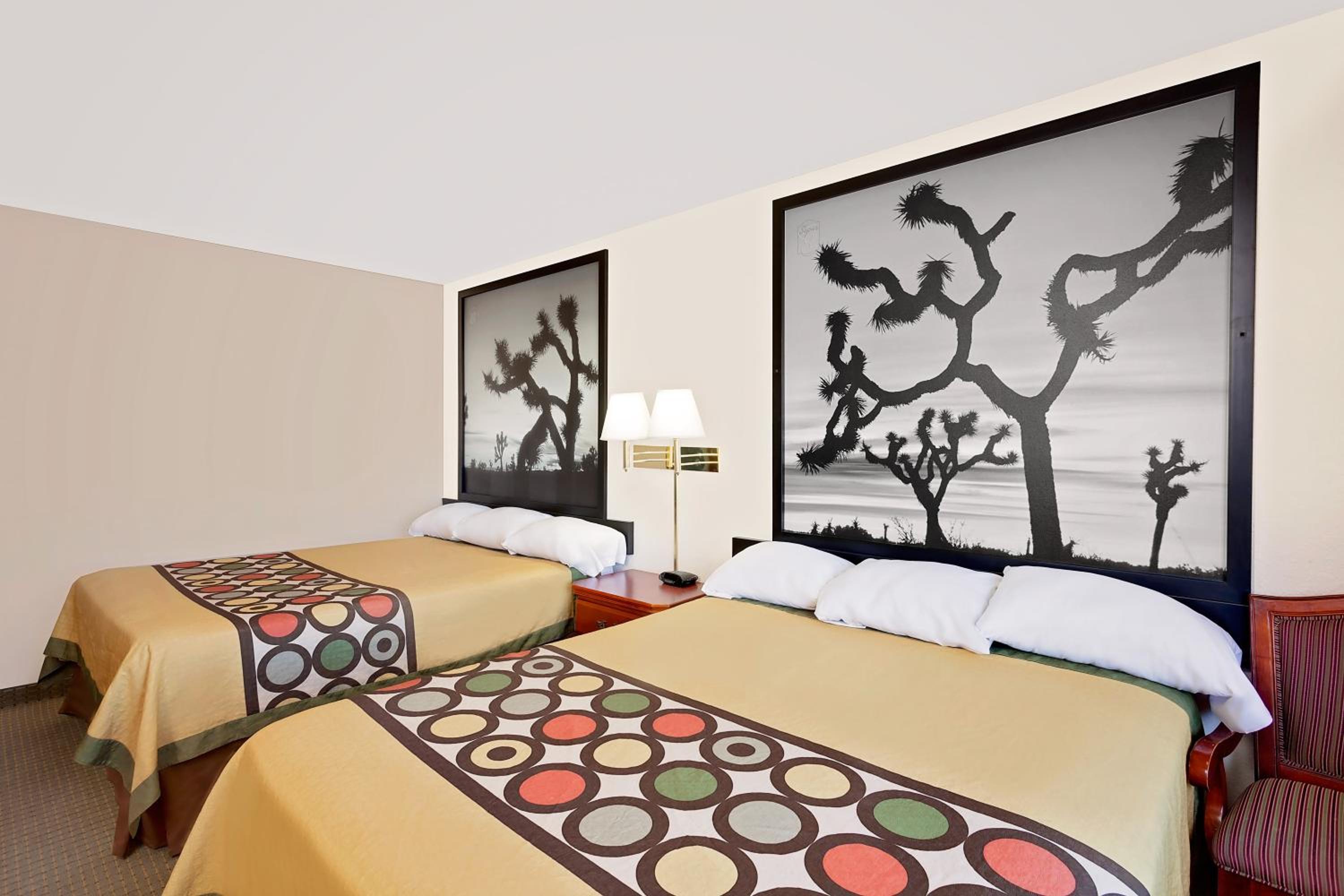 Suite with One King Bed and One Queen Bed - Non-Smoking - Photo 1