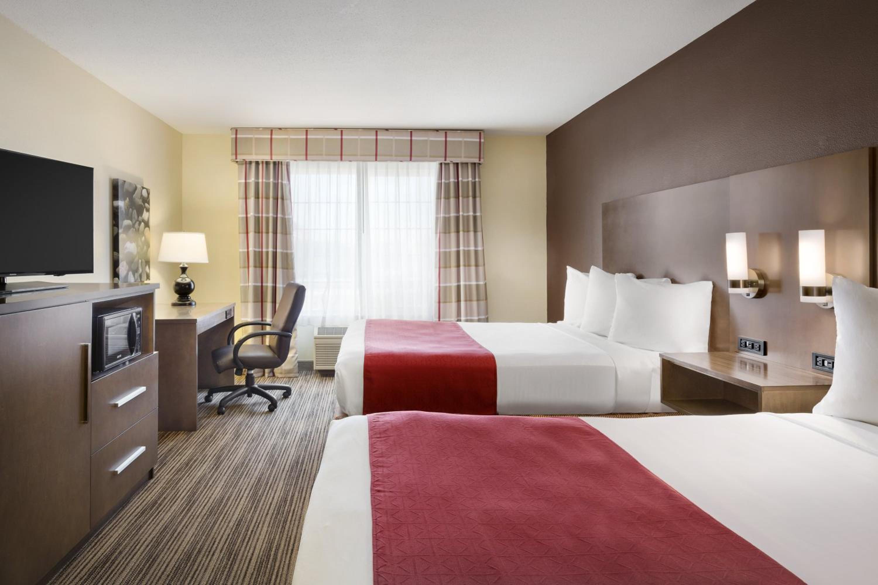 Queen Room with Two Queen Beds - Photo 1