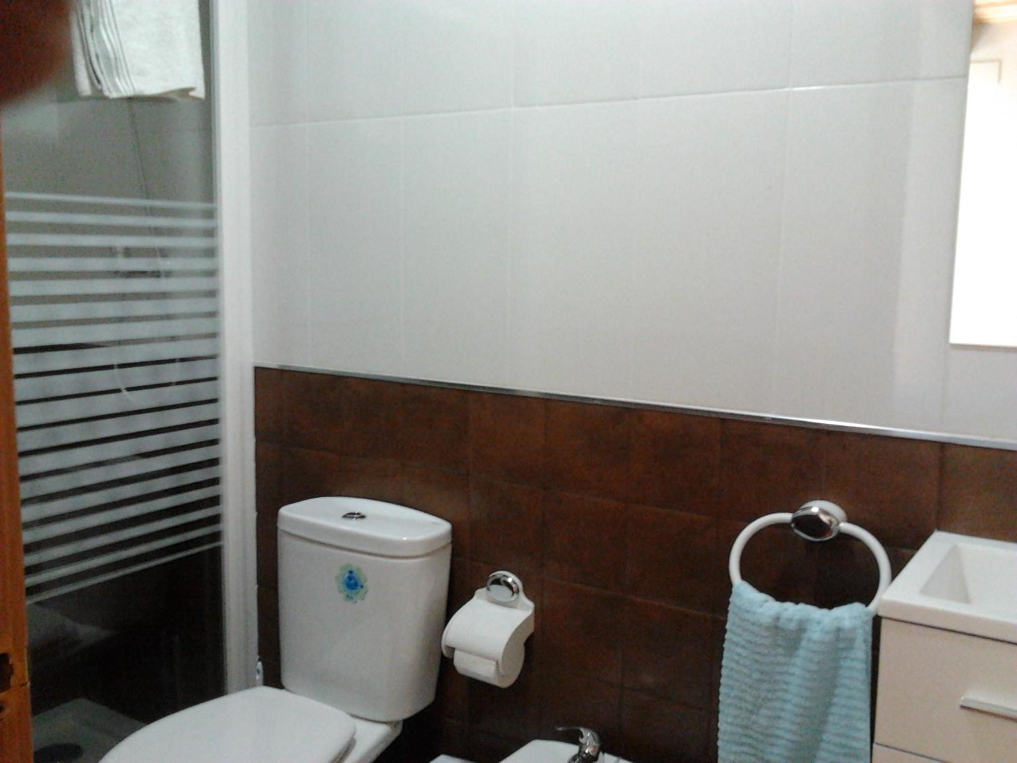 Three-Bedroom House - Photo 32