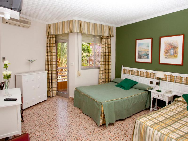 Triple Room (2 Adults + 1 Child) photo 2