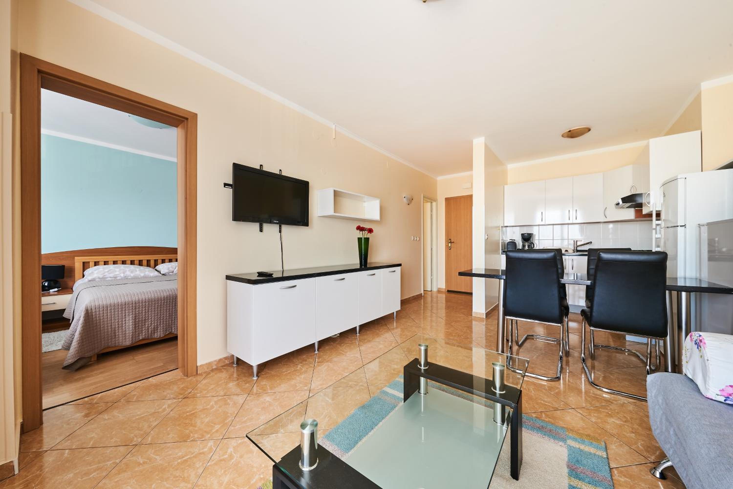 One-Bedroom Apartment with Balcony and City View