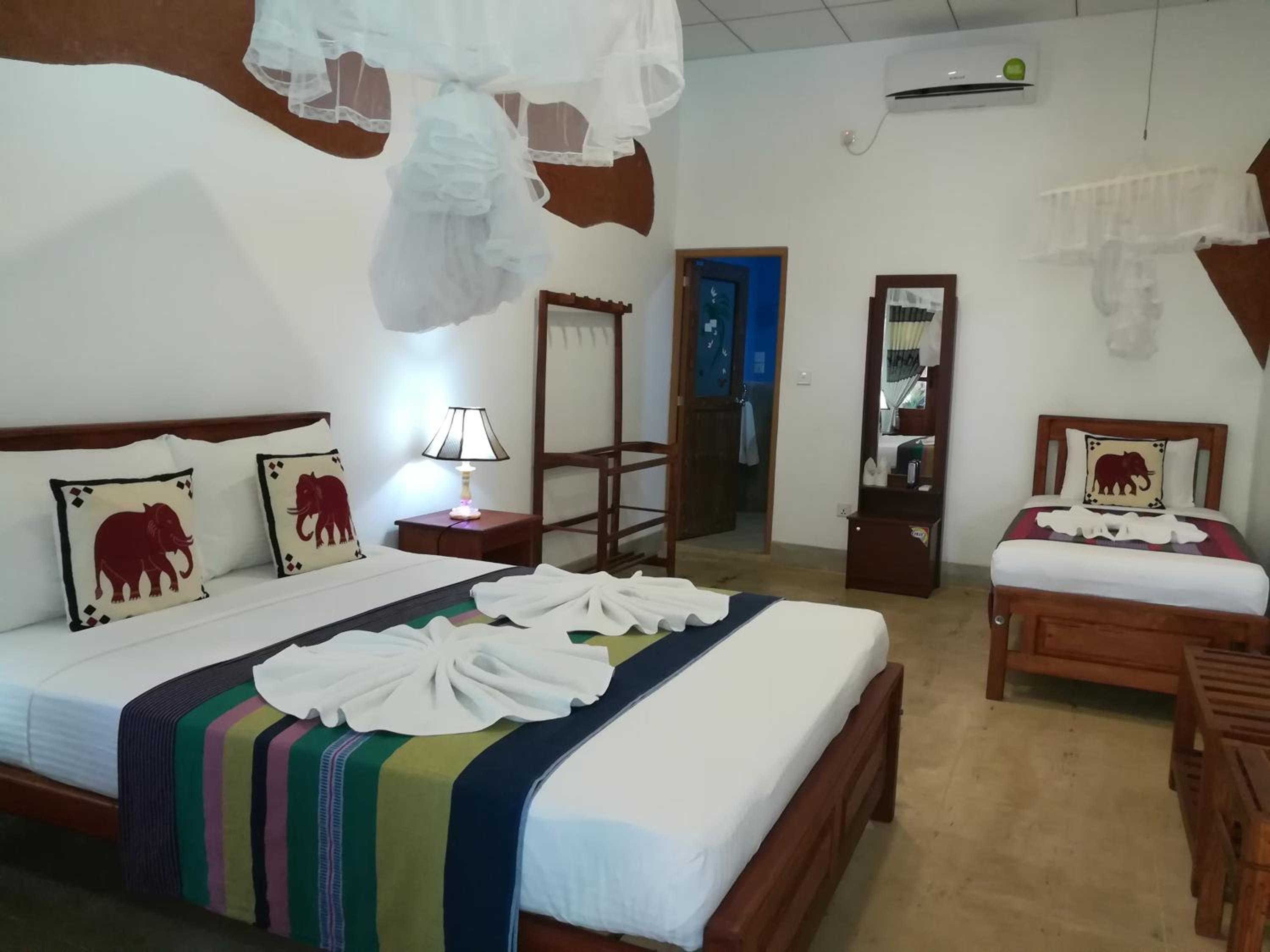 Deluxe Triple Room with Garden View