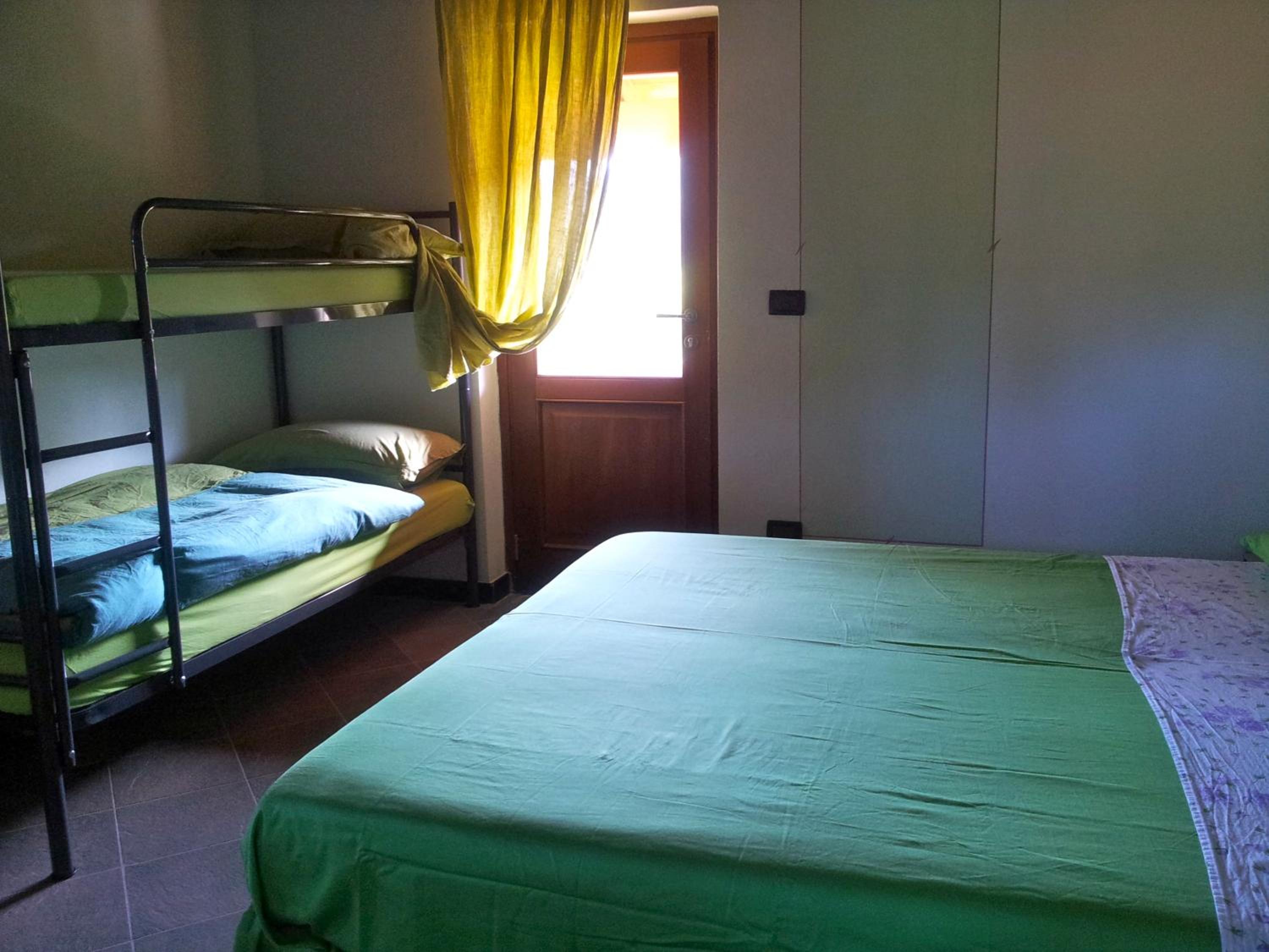 Quadruple Room - Photo 1