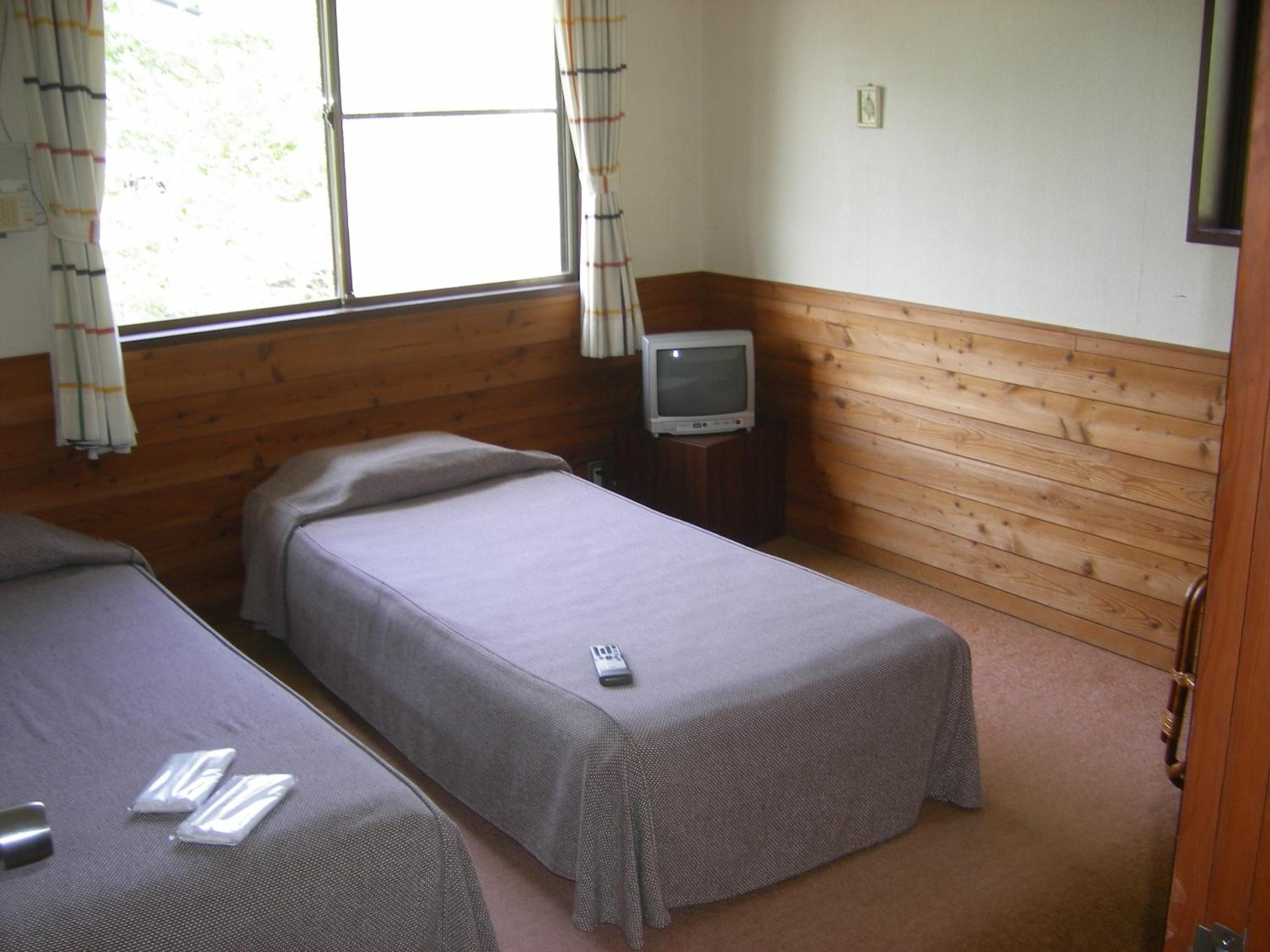 Twin Room - Photo 1