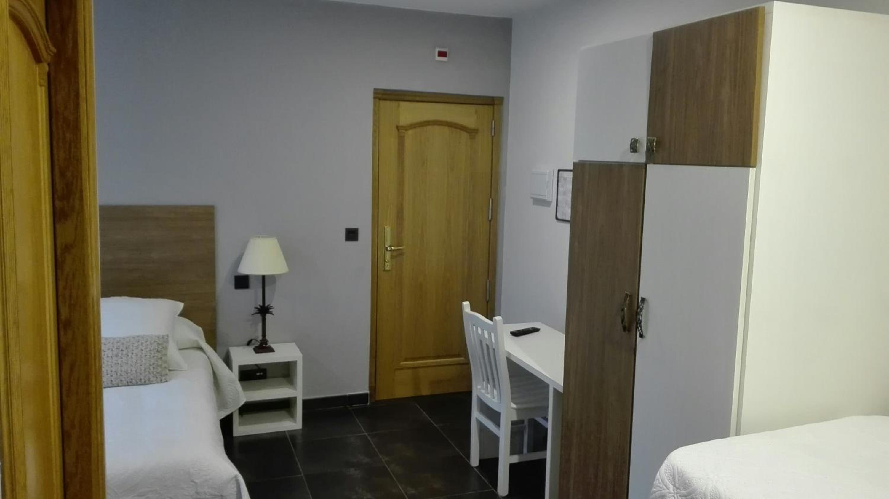 Habitación Cuádruple con Vista al Jardín