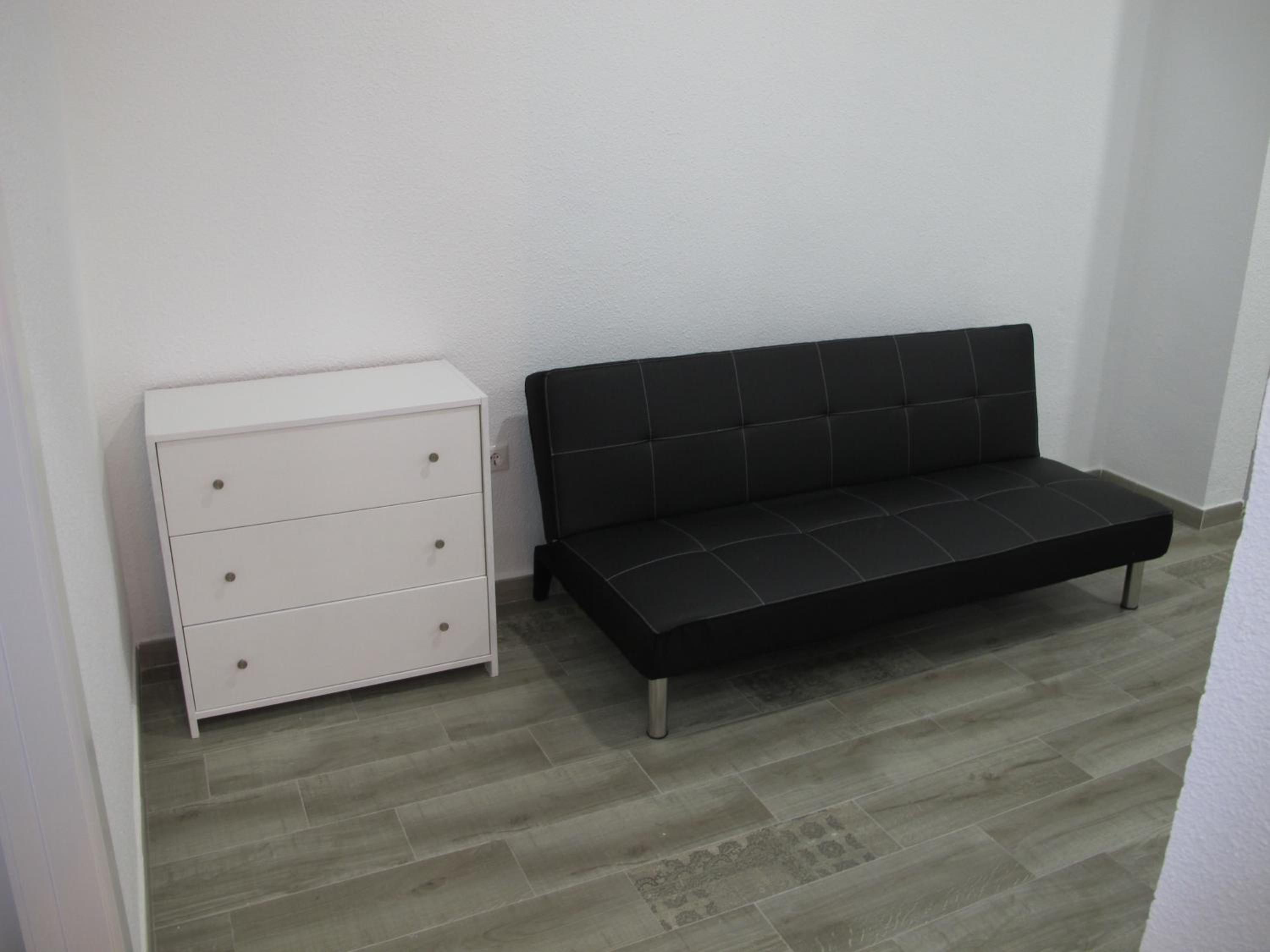 Three-Bedroom Apartment - Photo 45