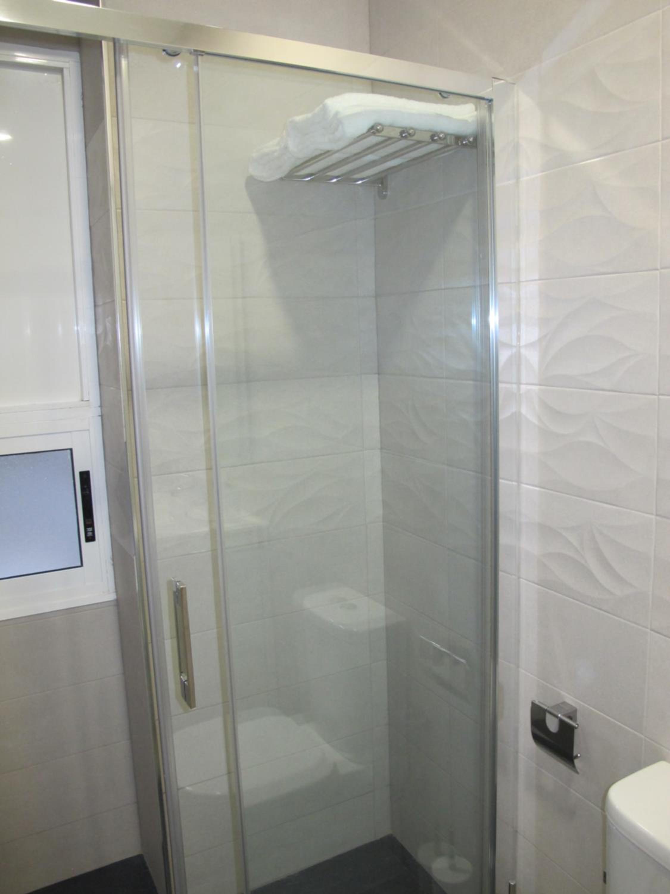 Three-Bedroom Apartment - Photo 30