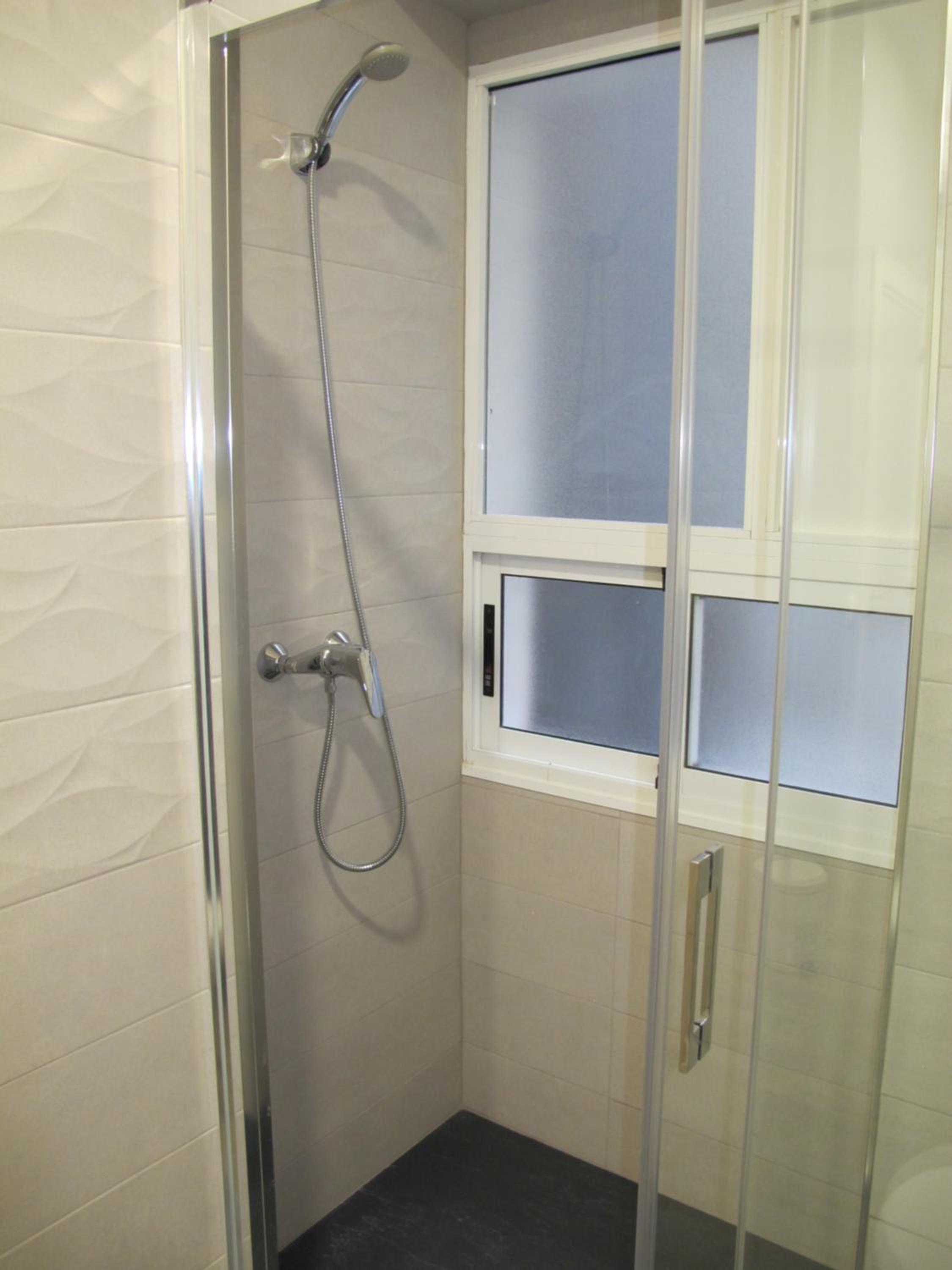 Three-Bedroom Apartment - Photo 32