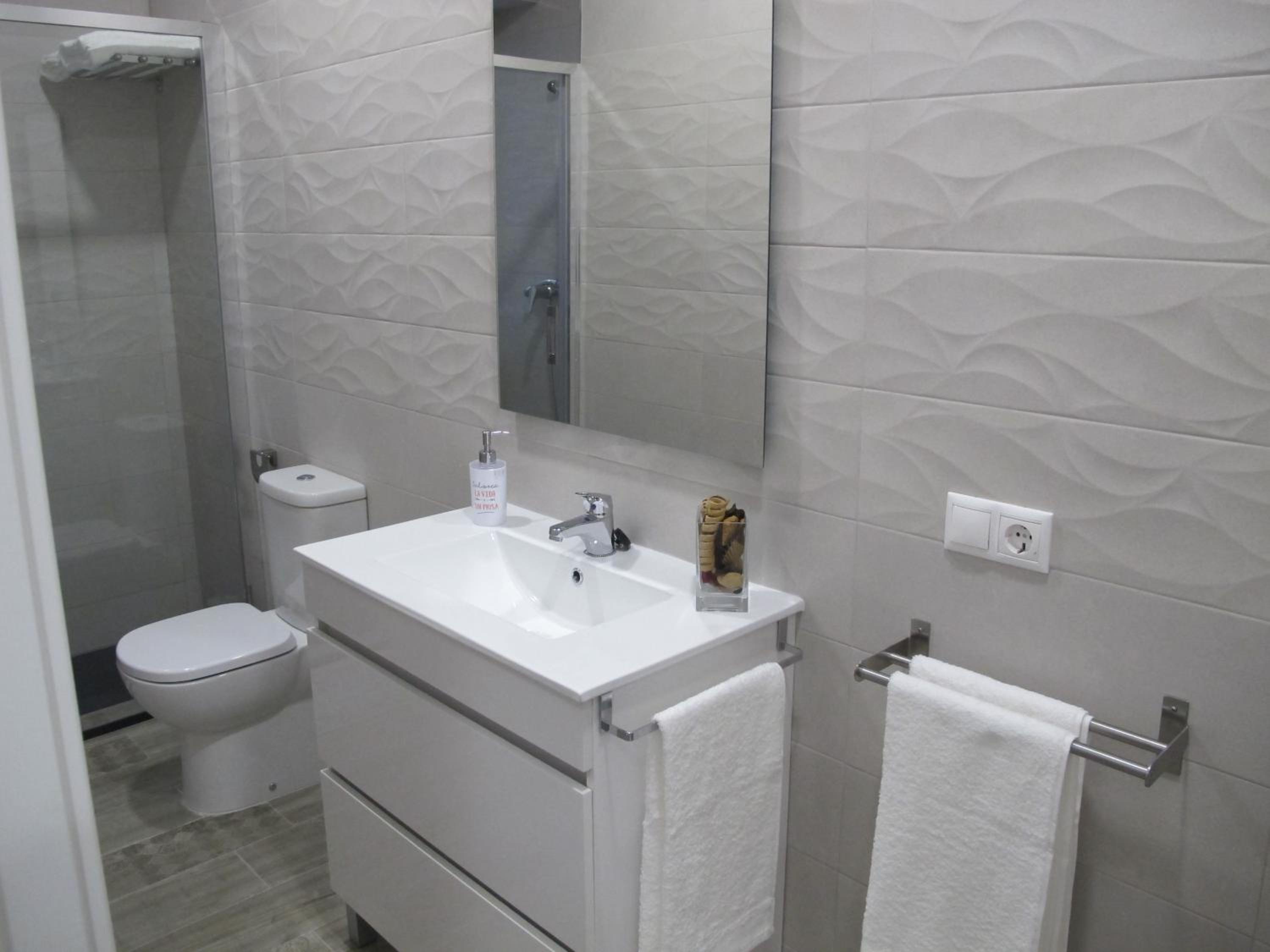 Three-Bedroom Apartment - Photo 44