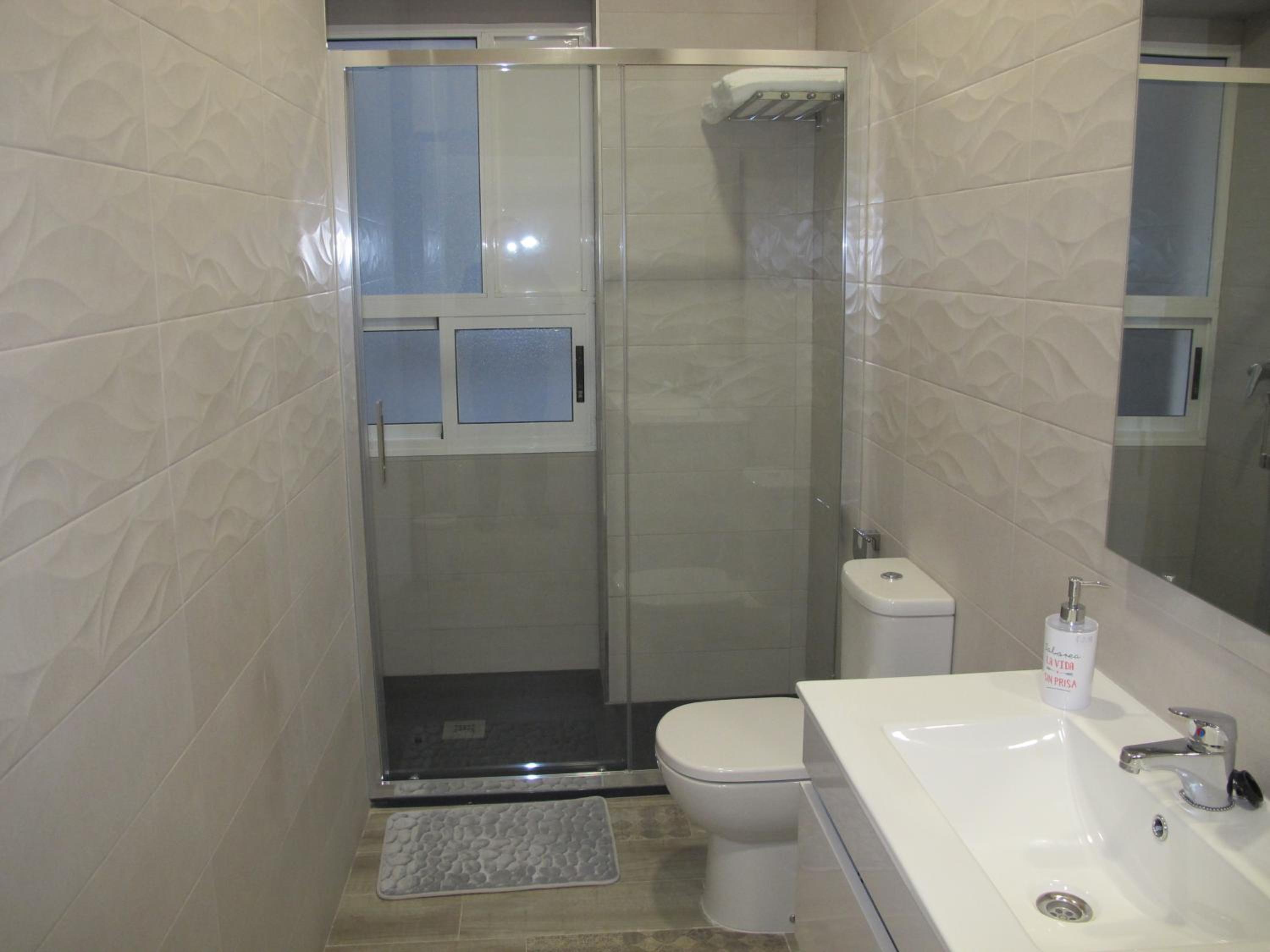 Three-Bedroom Apartment - Photo 34
