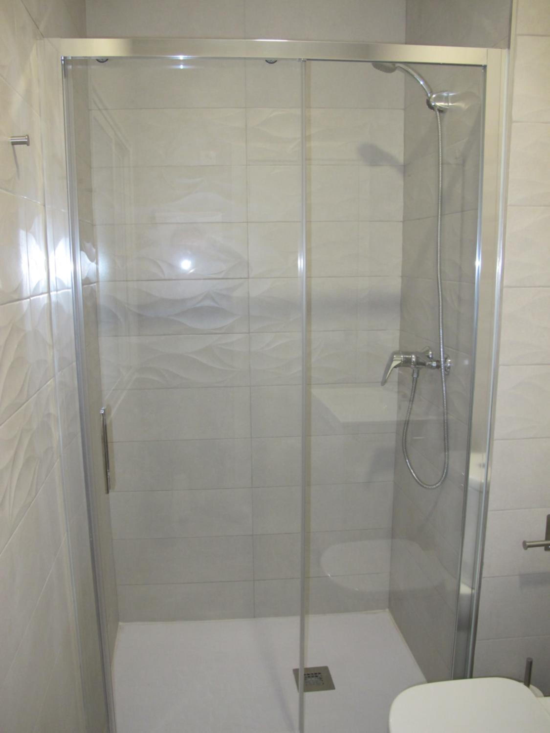 Three-Bedroom Apartment - Photo 36