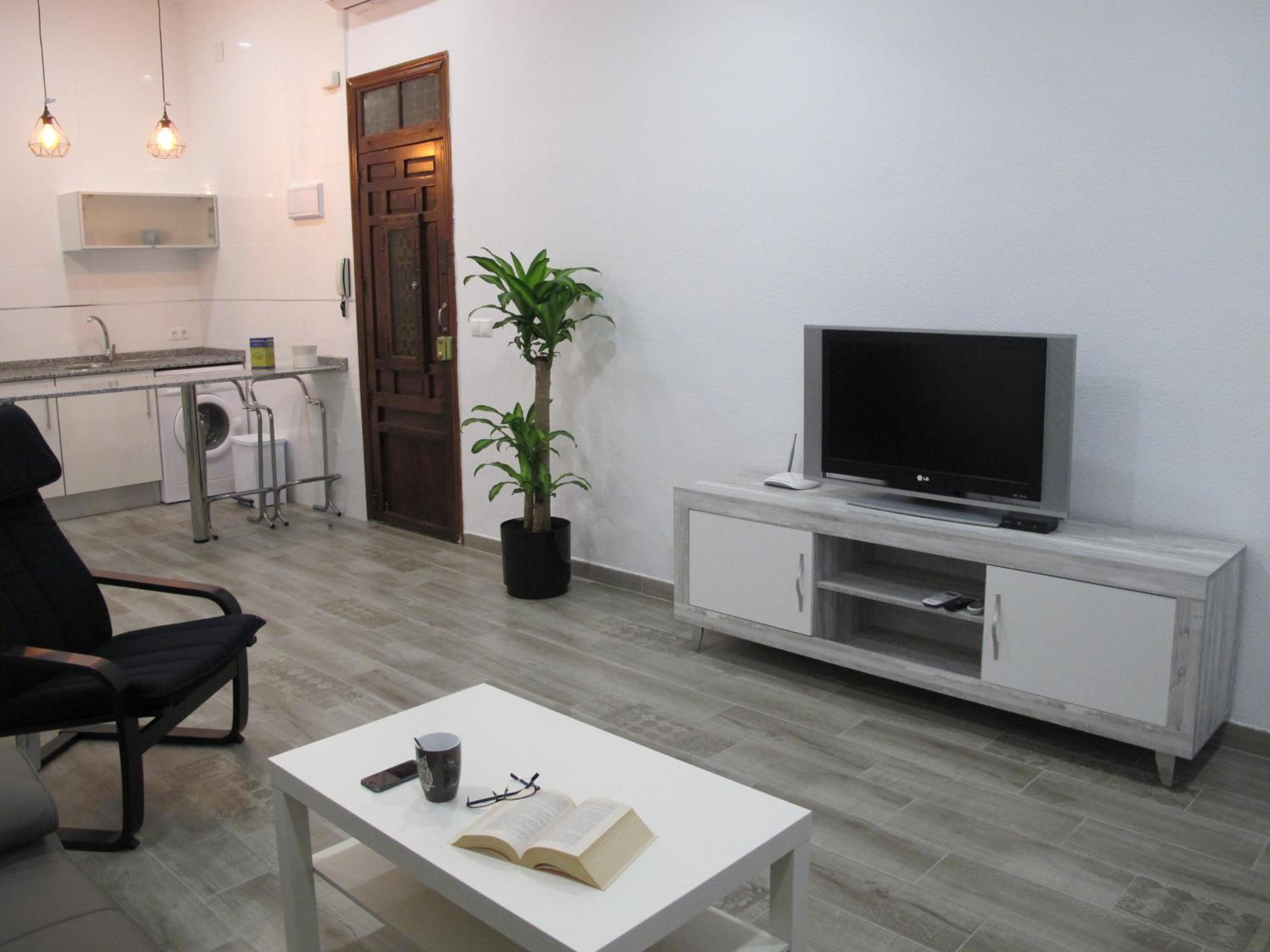 Three-Bedroom Apartment - Photo 40