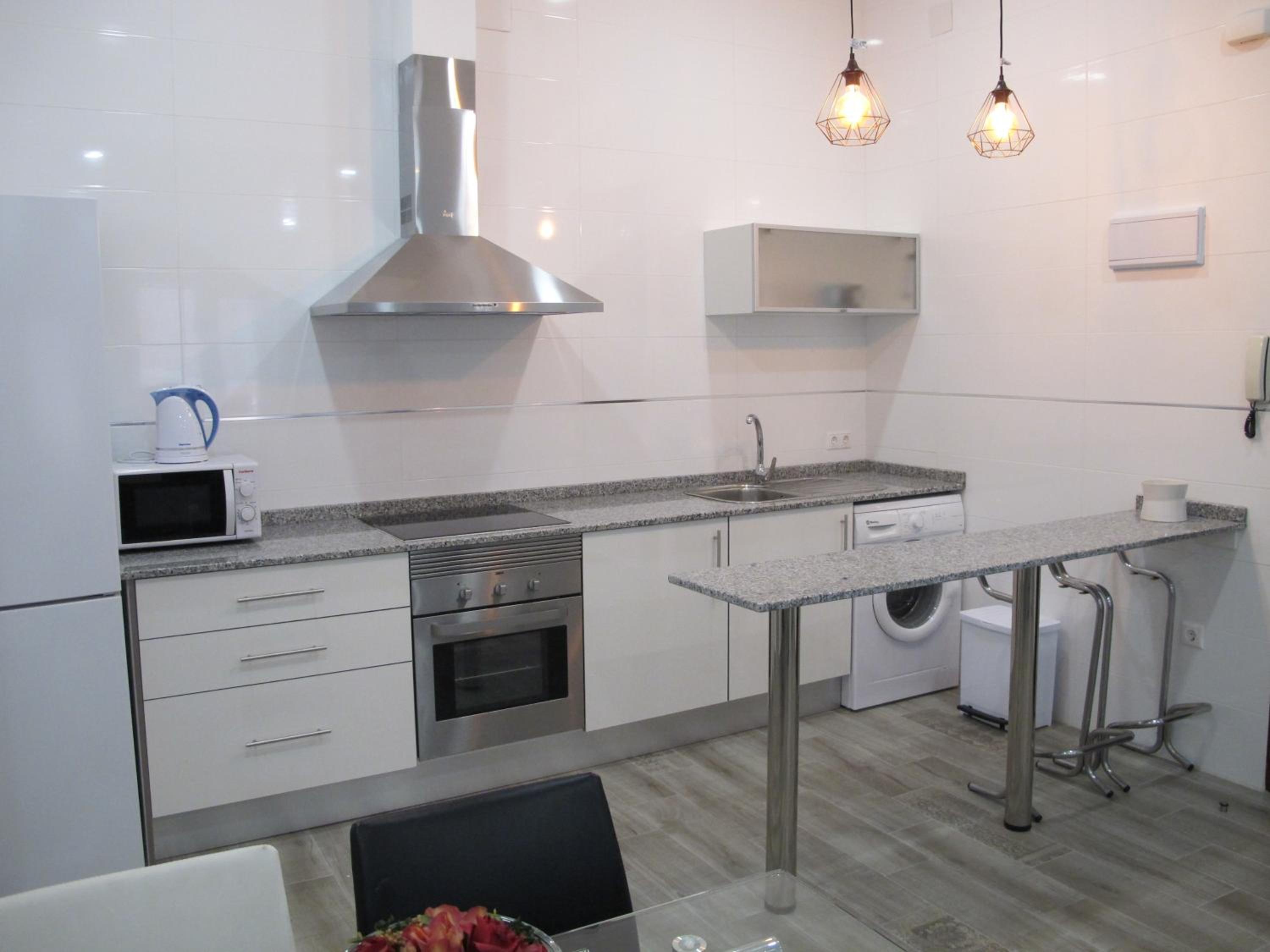 Three-Bedroom Apartment - Photo 16