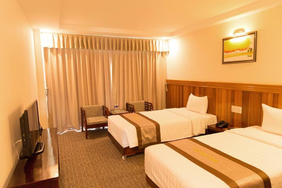 Standard Twin Room - Photo 1