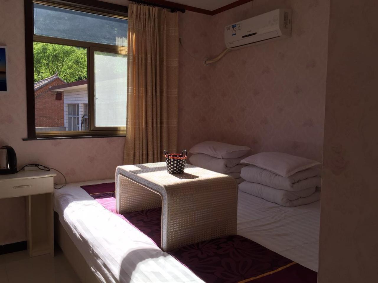Economy Triple Room photo 3