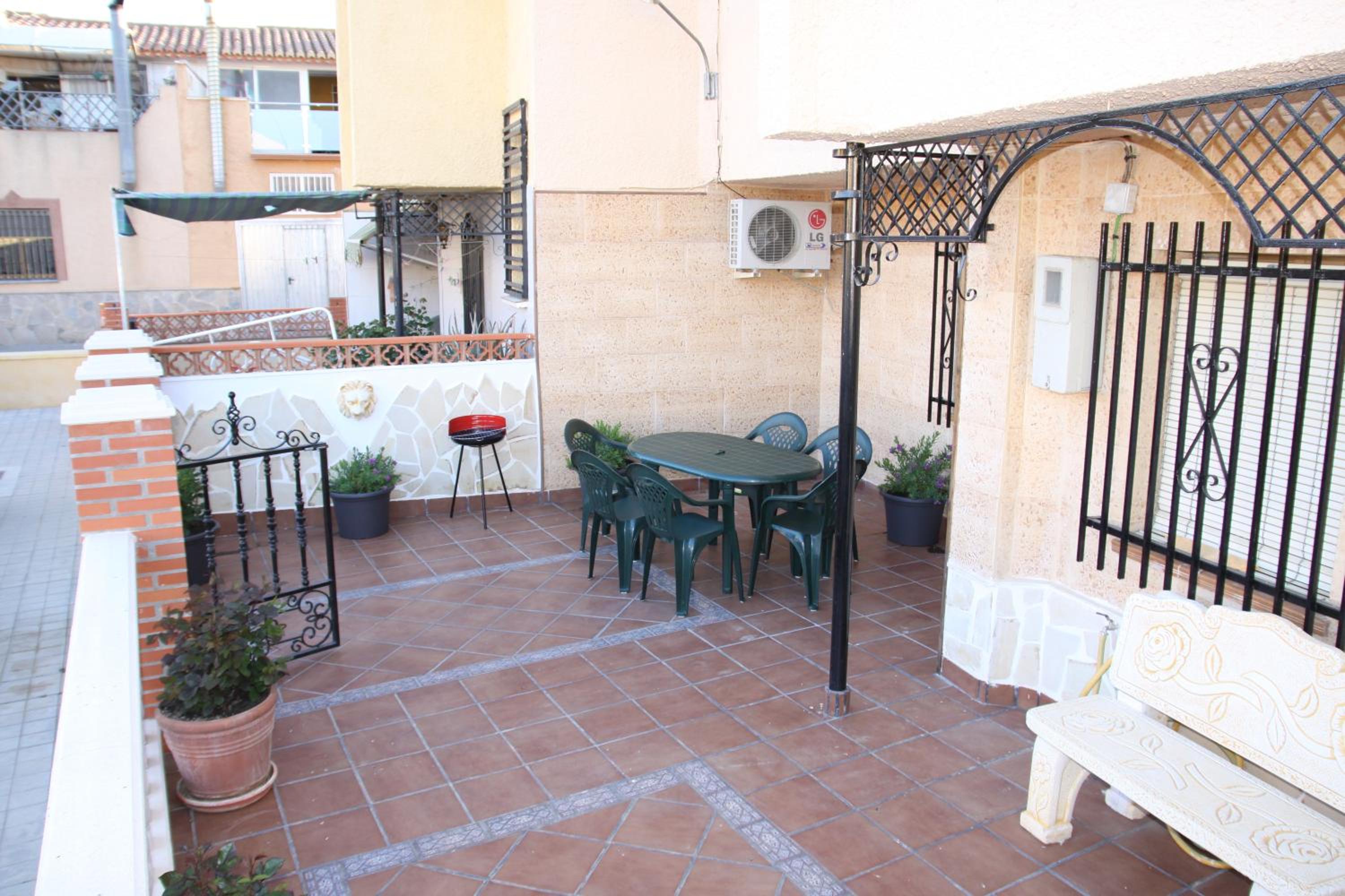 Three-Bedroom Townhouse with Patio and Terrace - Photo 8