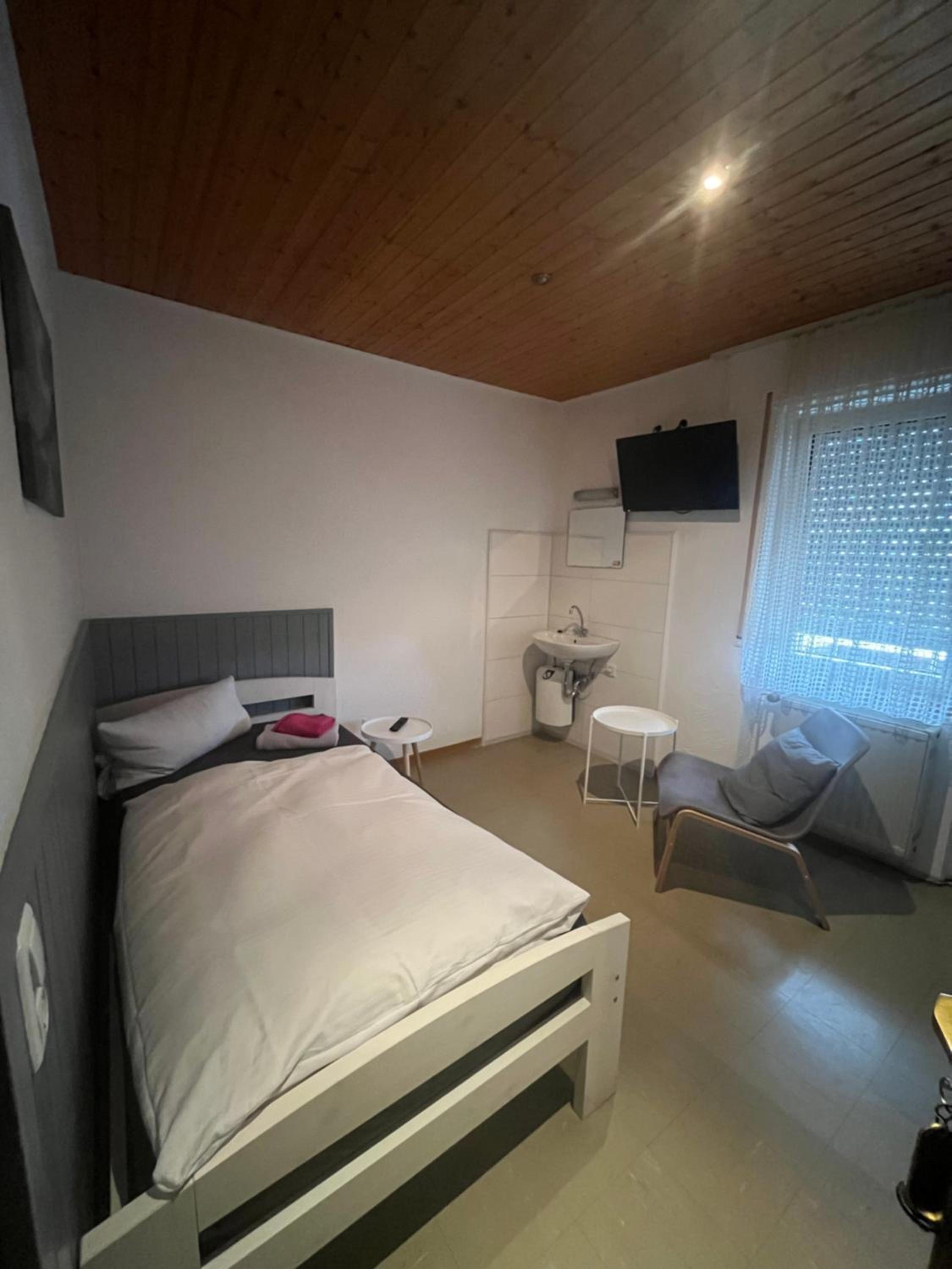 Single Room with Shared Shower and Toilet