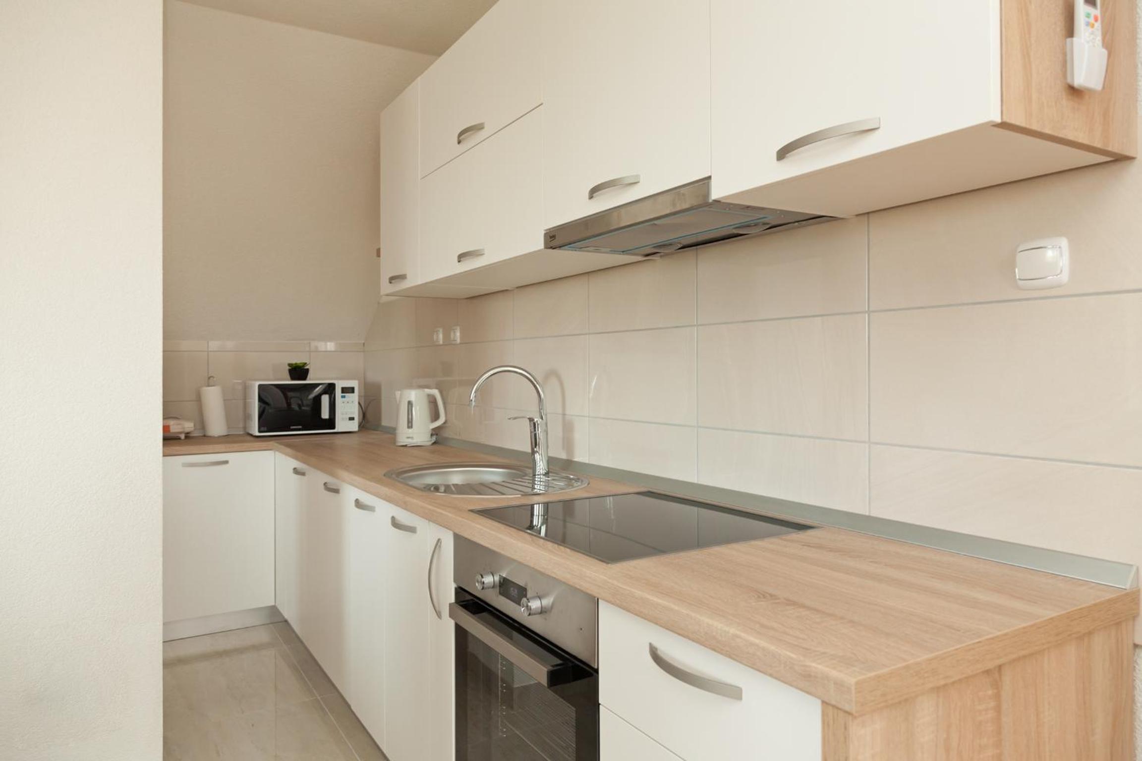 Apartment with Balcony - Photo 13