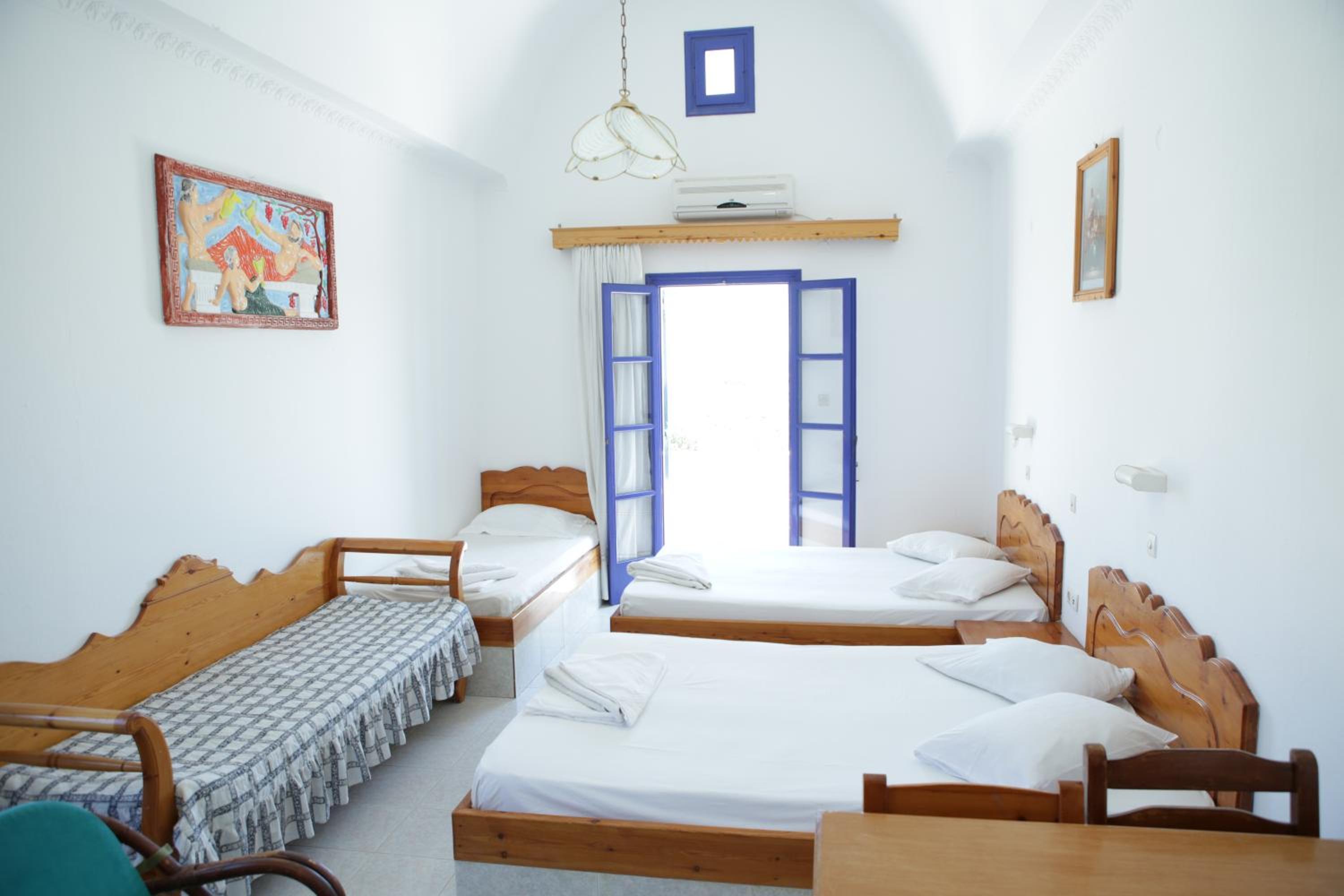 Quadruple Room with Balcony photo 2