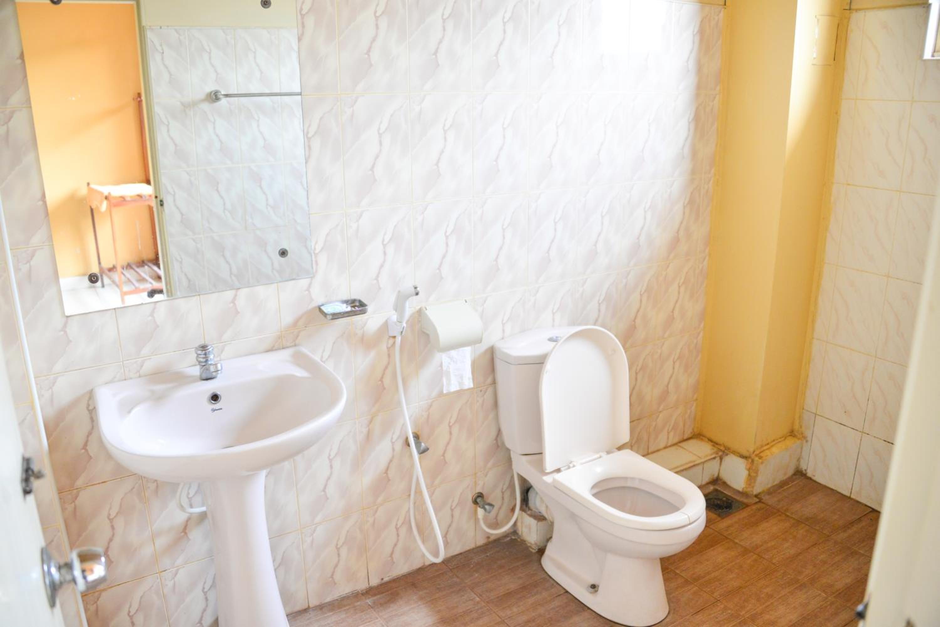 Standard Triple Room With Fan photo 2