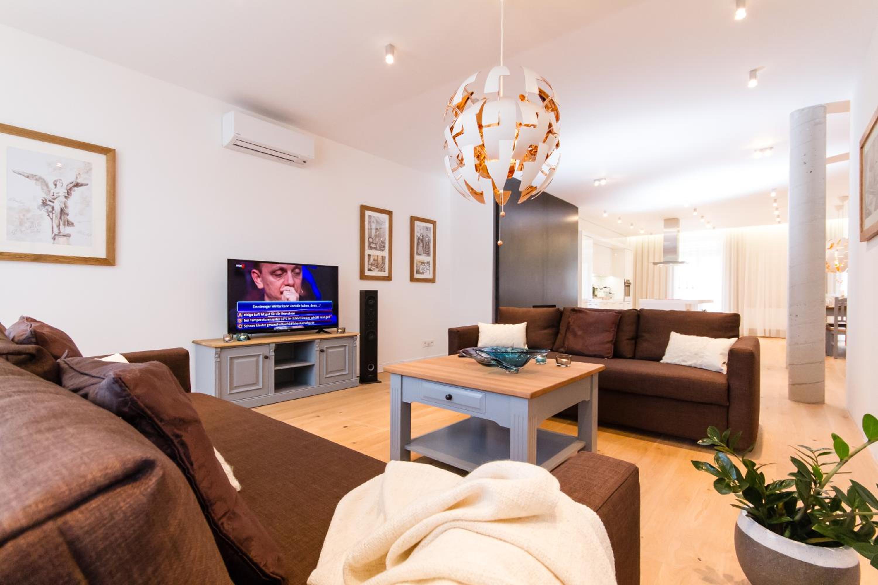 Four-Bedroom Apartment with Balcony 