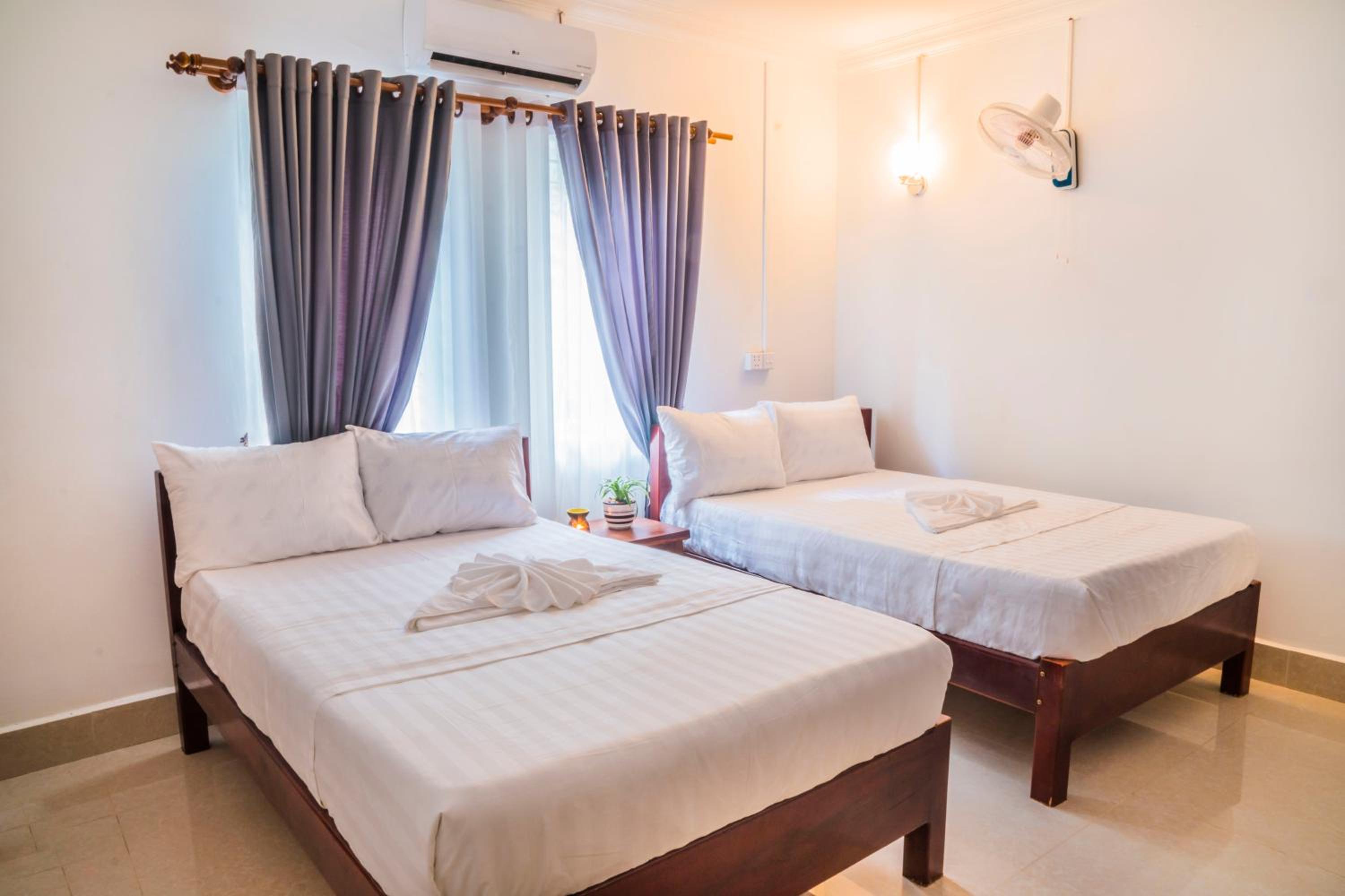 Standard Twin Room - Photo 12