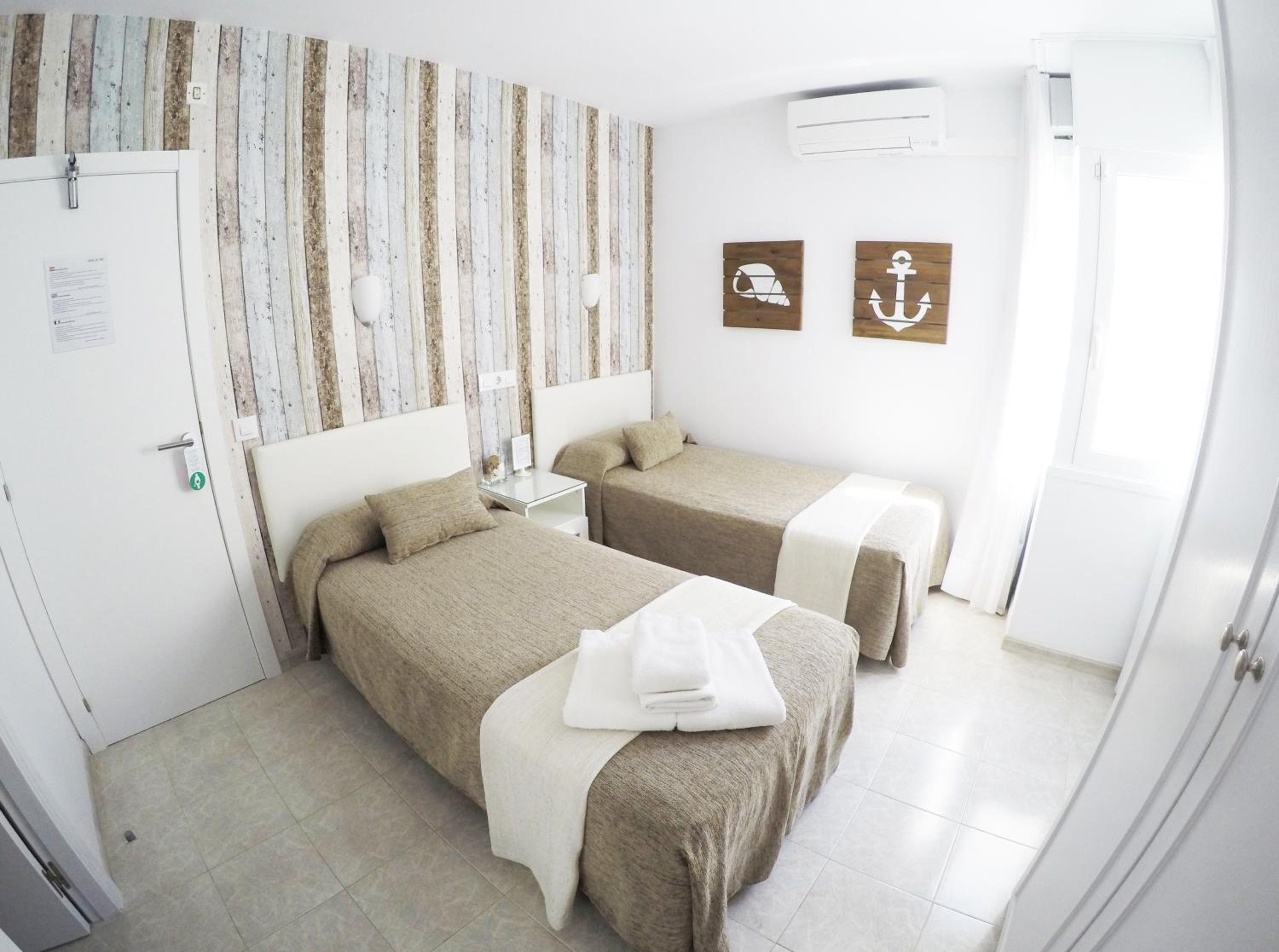 Habitación Doble Estándar o con Dos Camas Individuales.