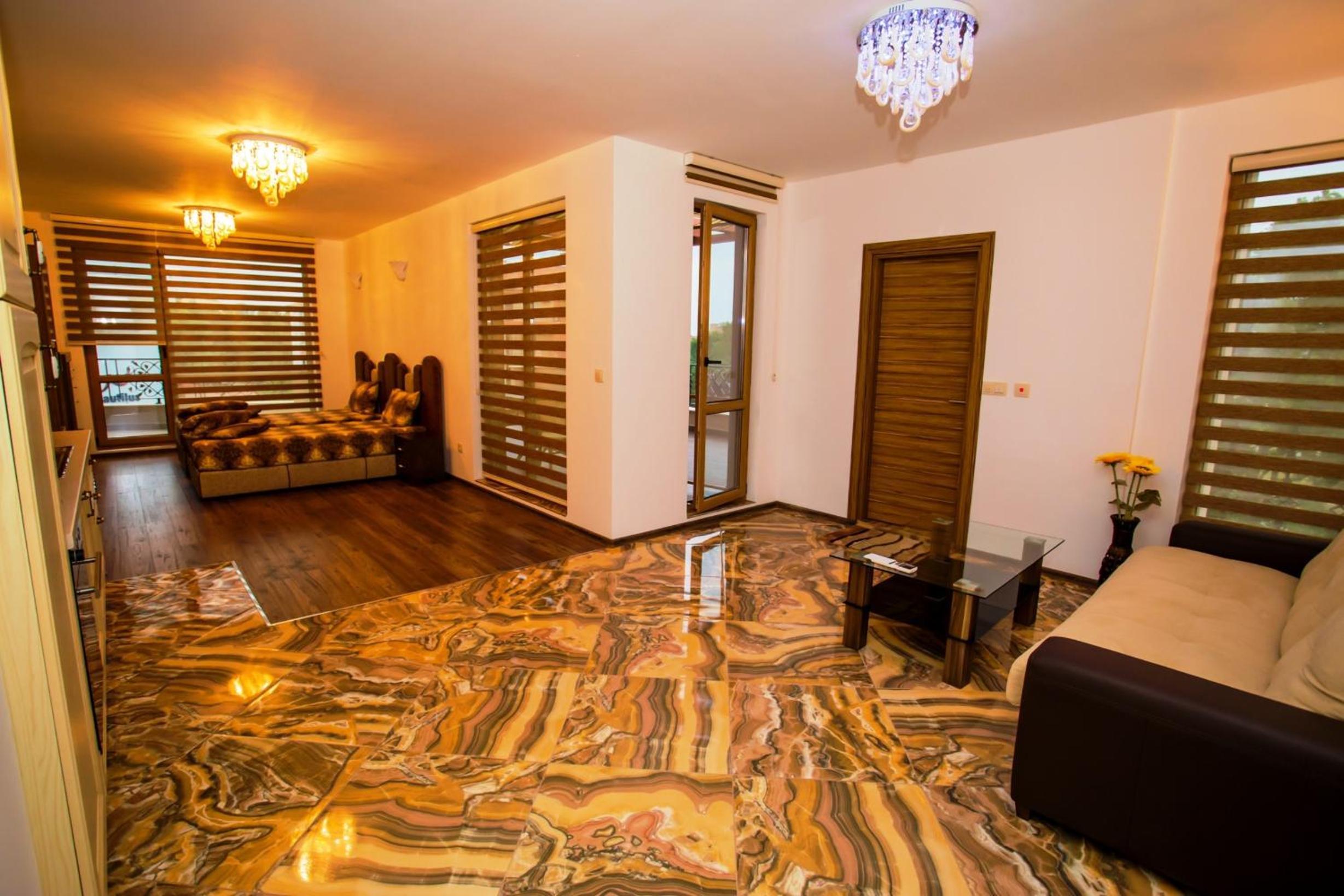 Deluxe Studio (3 Adults + 1 Child) with Balcony photo 1