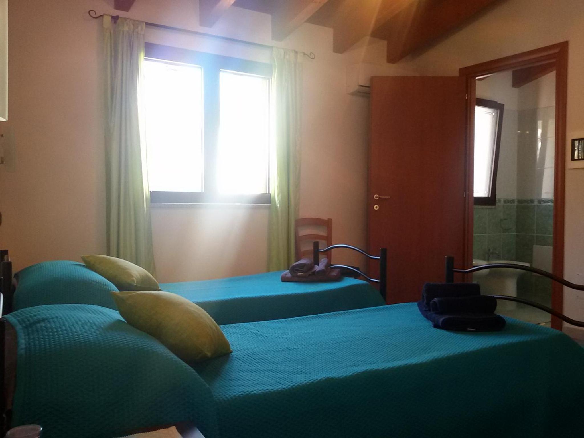 Quadruple Room with Private Bathroom photo 2