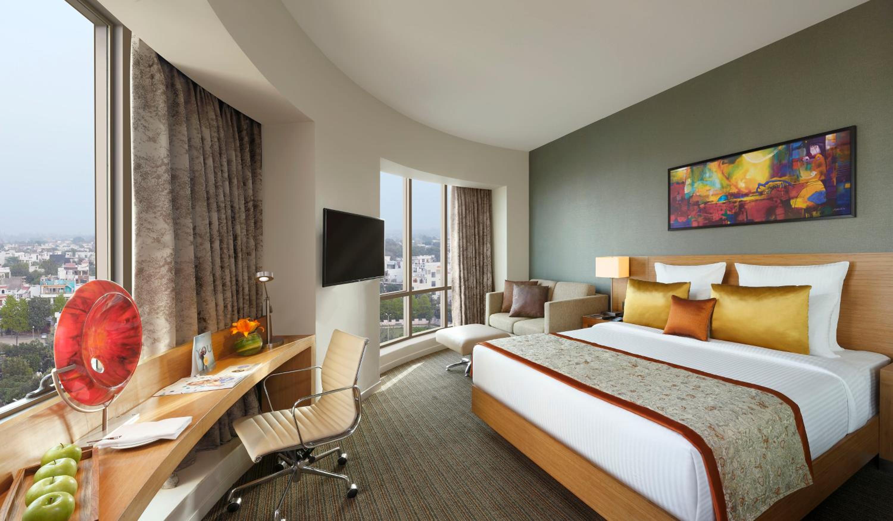 Executive Room | Unlimited IMFL at the Premium Lounge from 6–8 pm, one-way airport transfer, and 20% discounts on F&B, Laundry, Spa, and Transport
