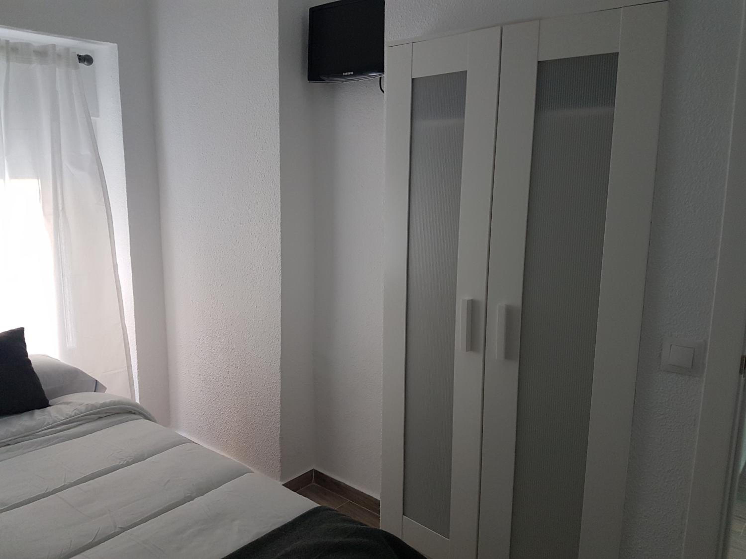 Habitación individual con baño compartido