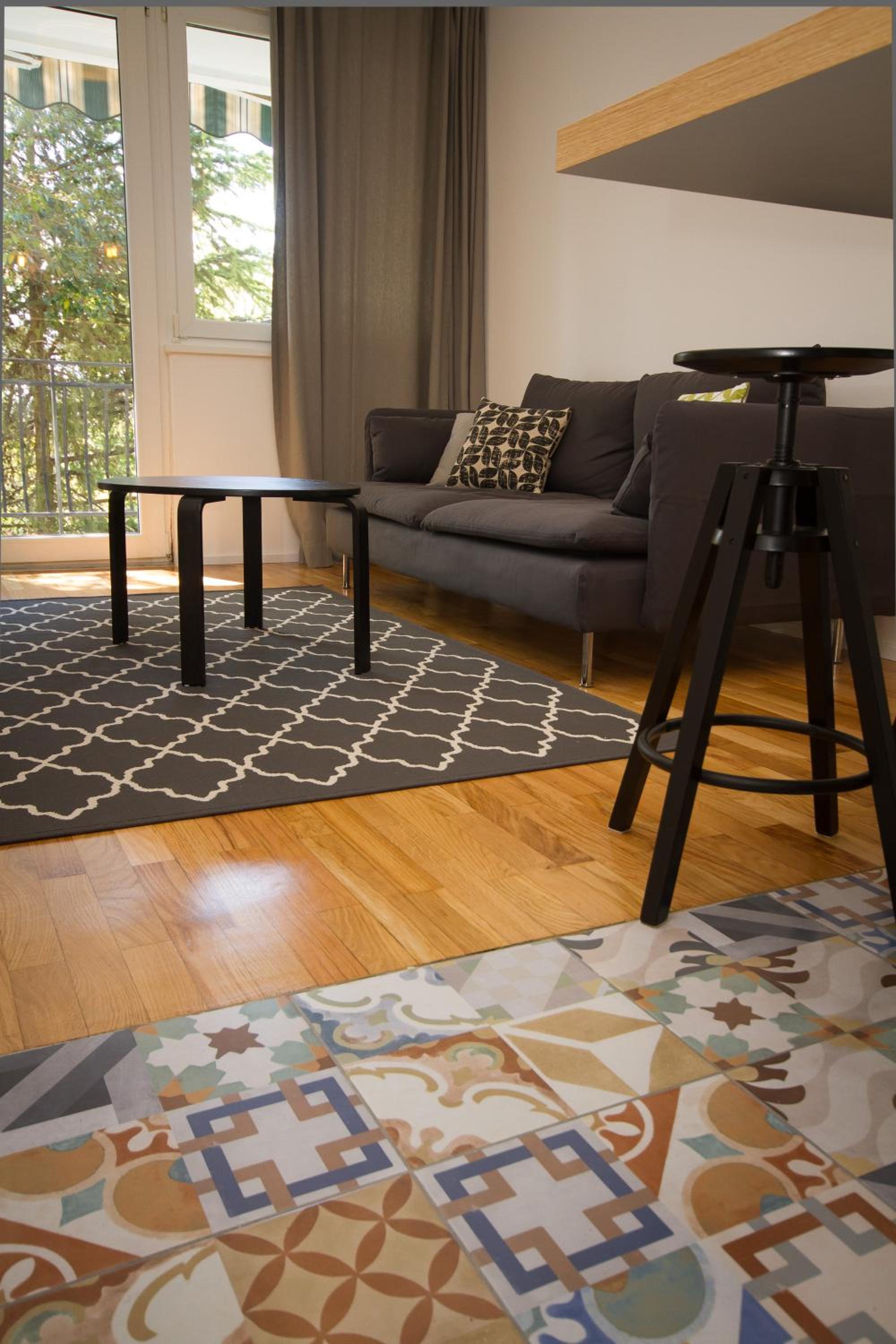 Two-Bedroom Apartment with Balcony and Garden View - Photo 1