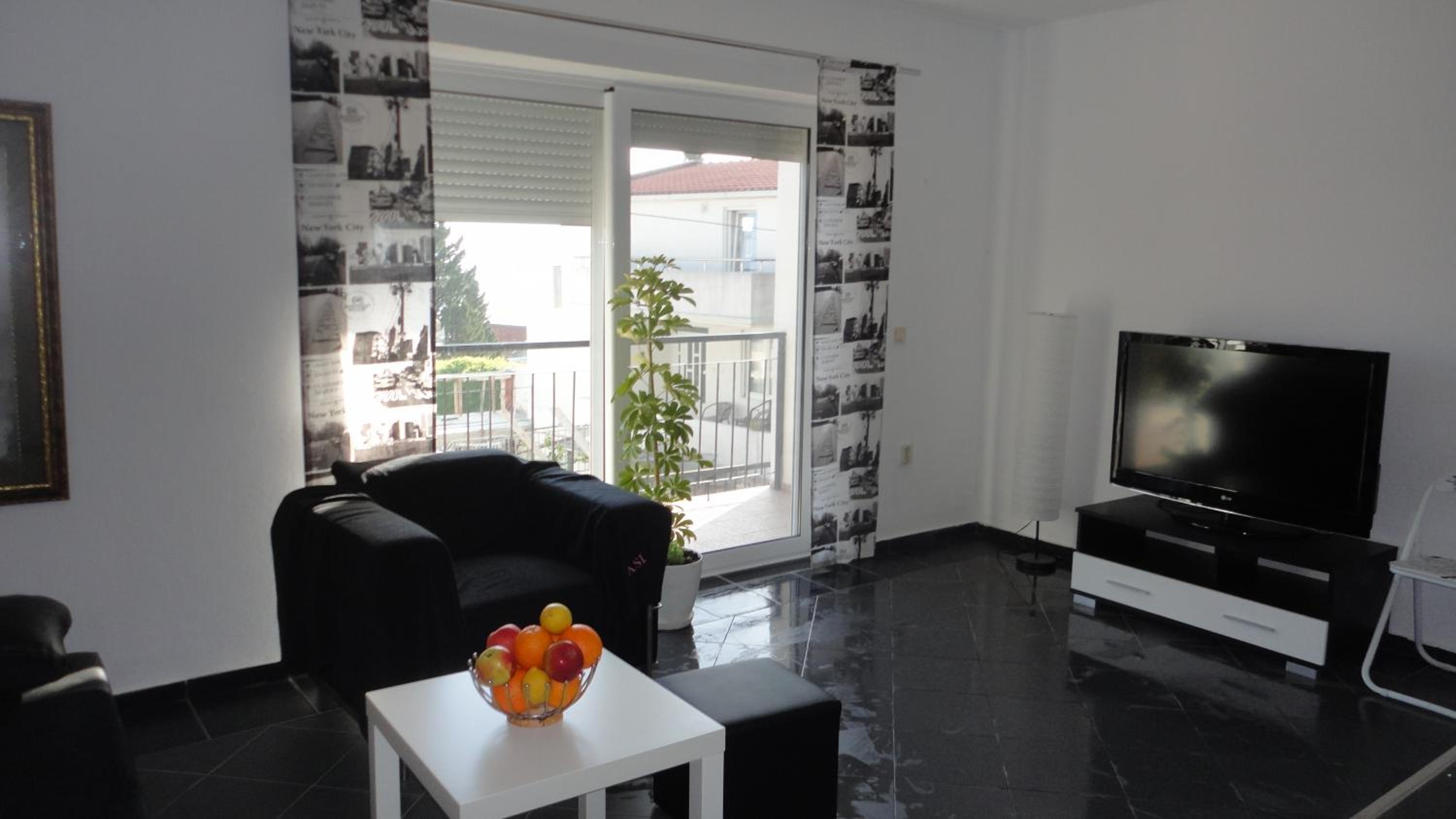 Two-Bedroom Apartment with Balcony and Sea View