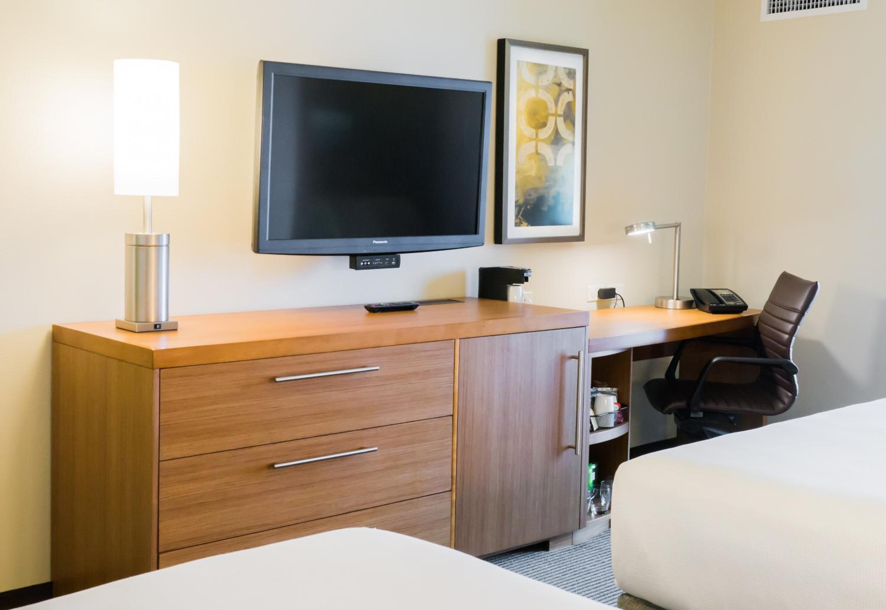Queen Room with Two Queen Beds and Sofa Bed - Photo 2