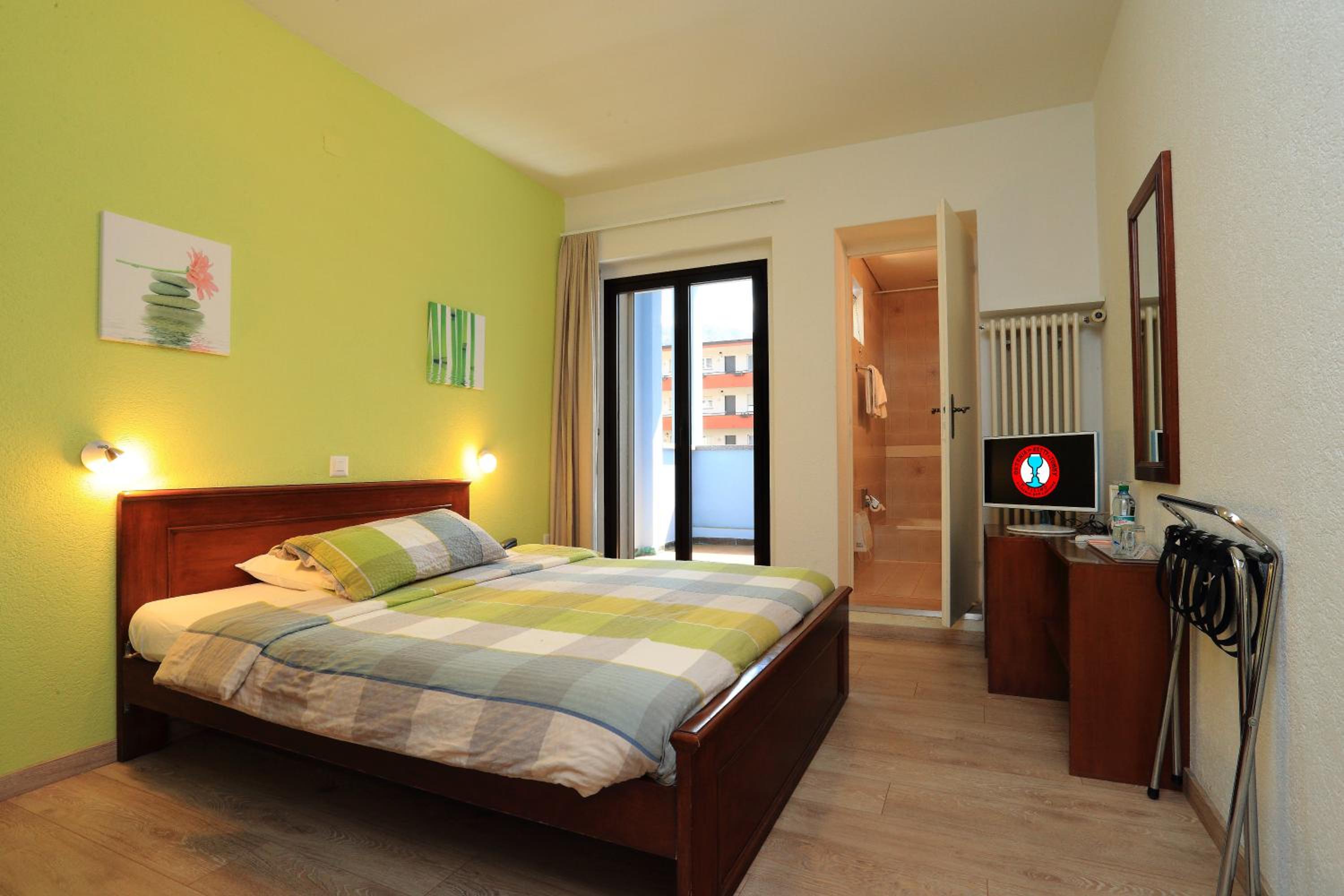 Double or Twin Room with Balcony and Garden View