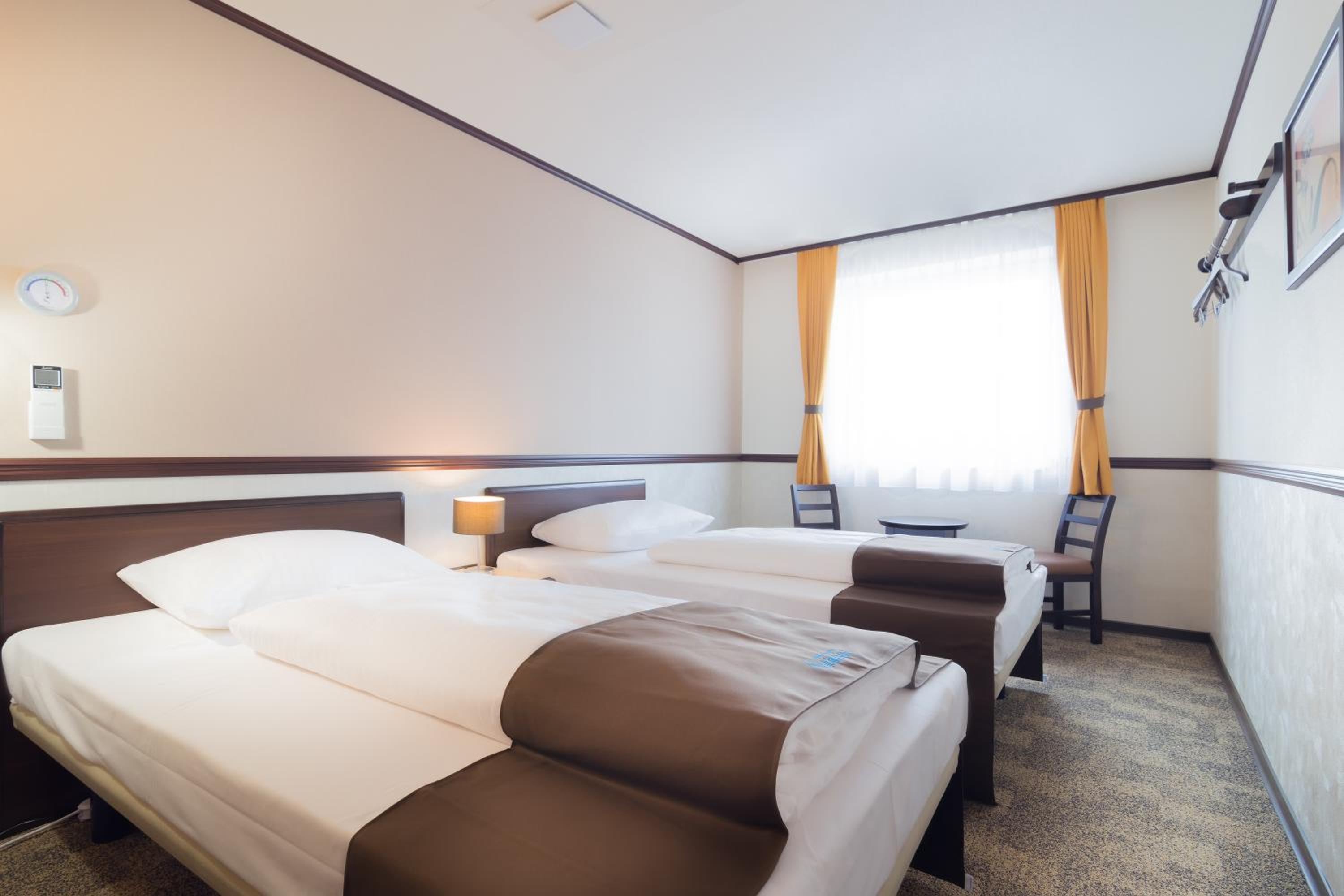 Twin Room - Photo 1