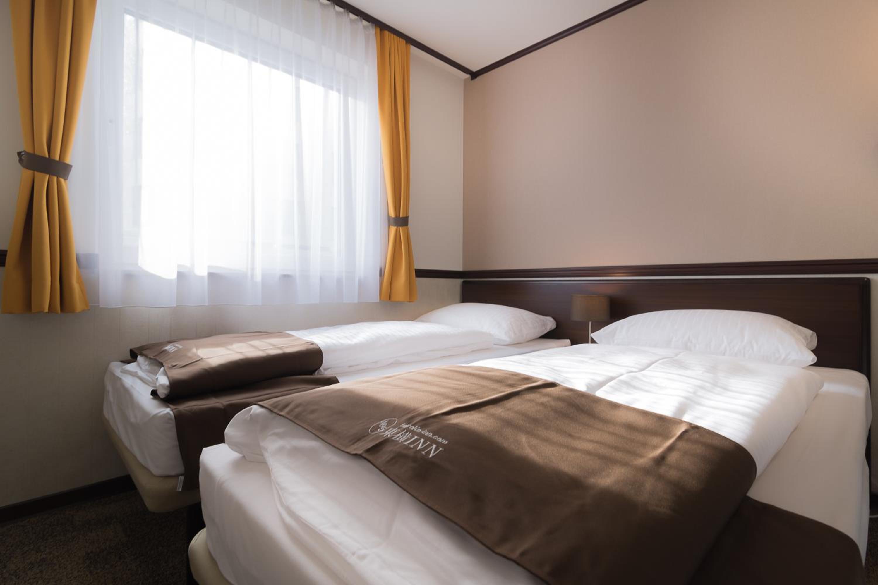 Economy Twin Room - Photo 6