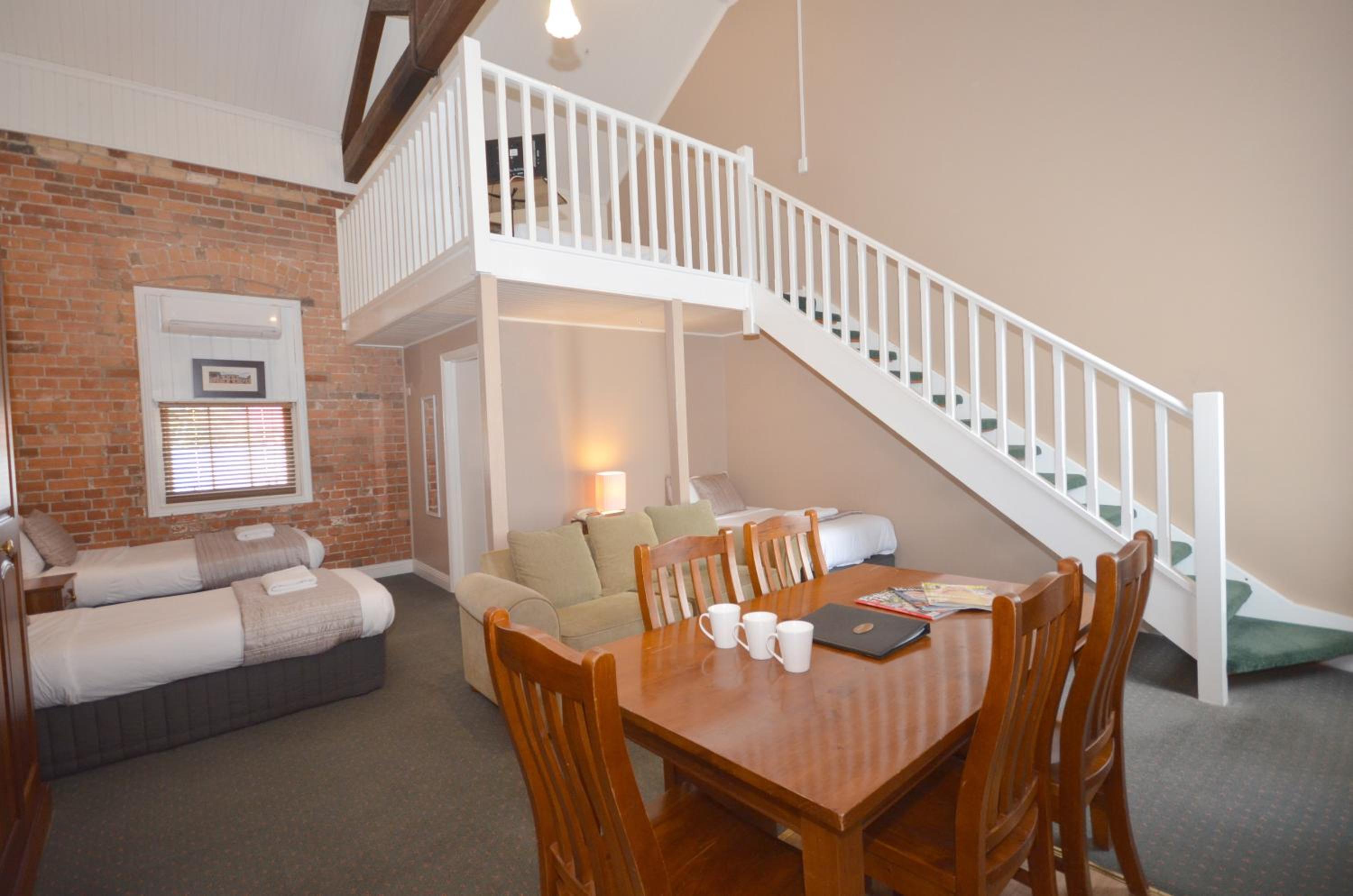  Heritage Deluxe Mezzanine Family Room photo 1