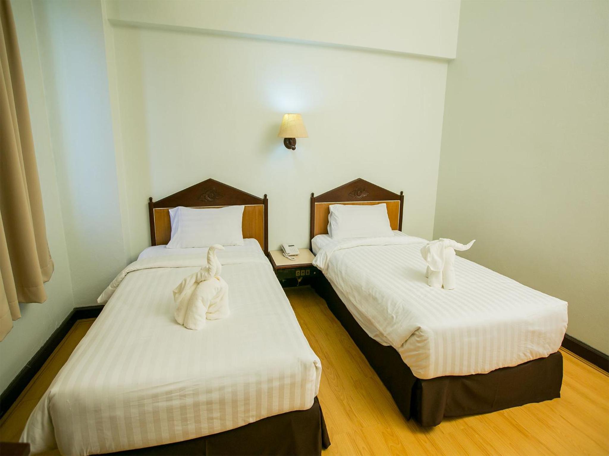 Standard Twin Room - Photo 4