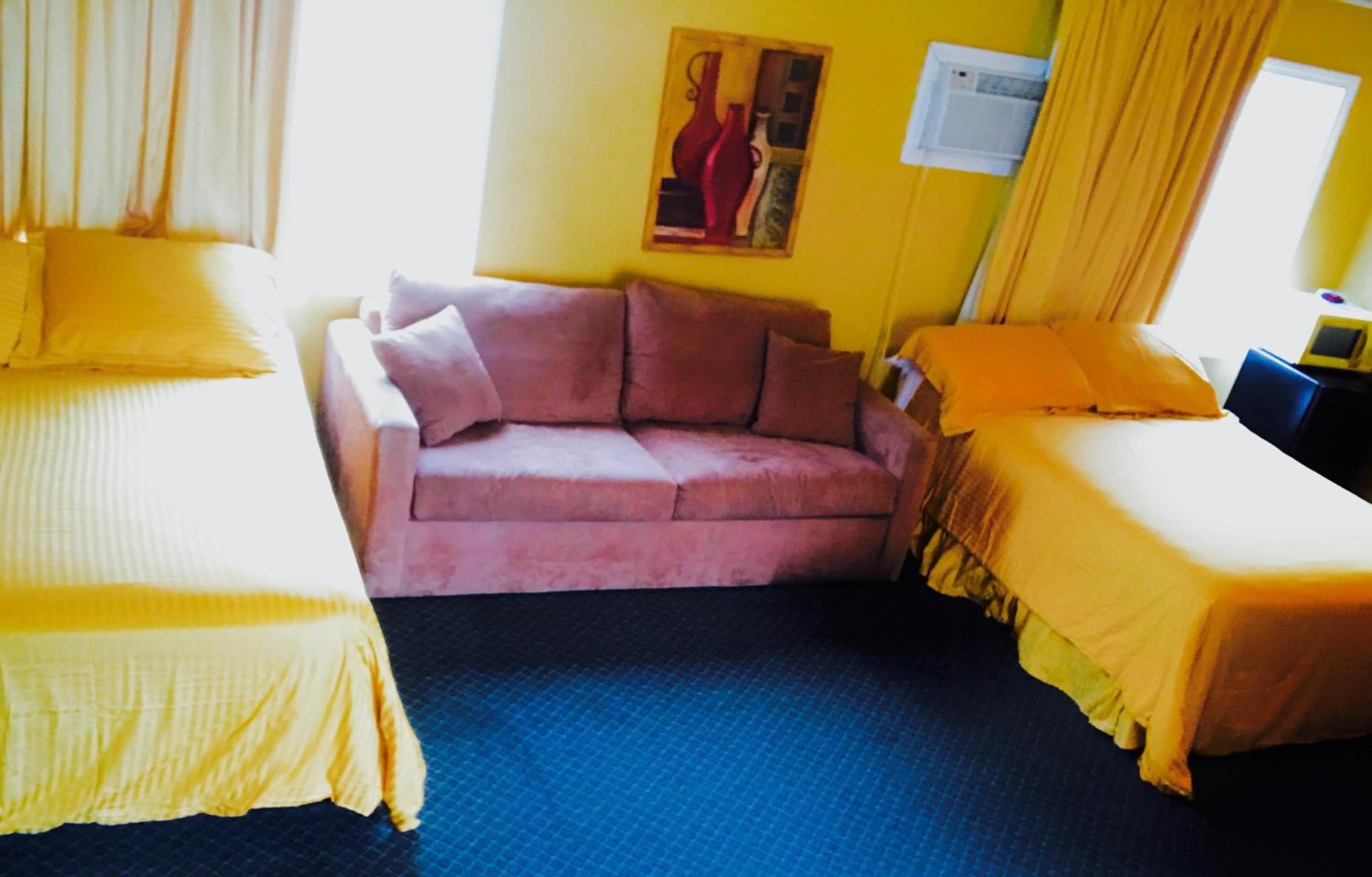 Queen Room with Two Queen Beds and Sofa Bed and Patio