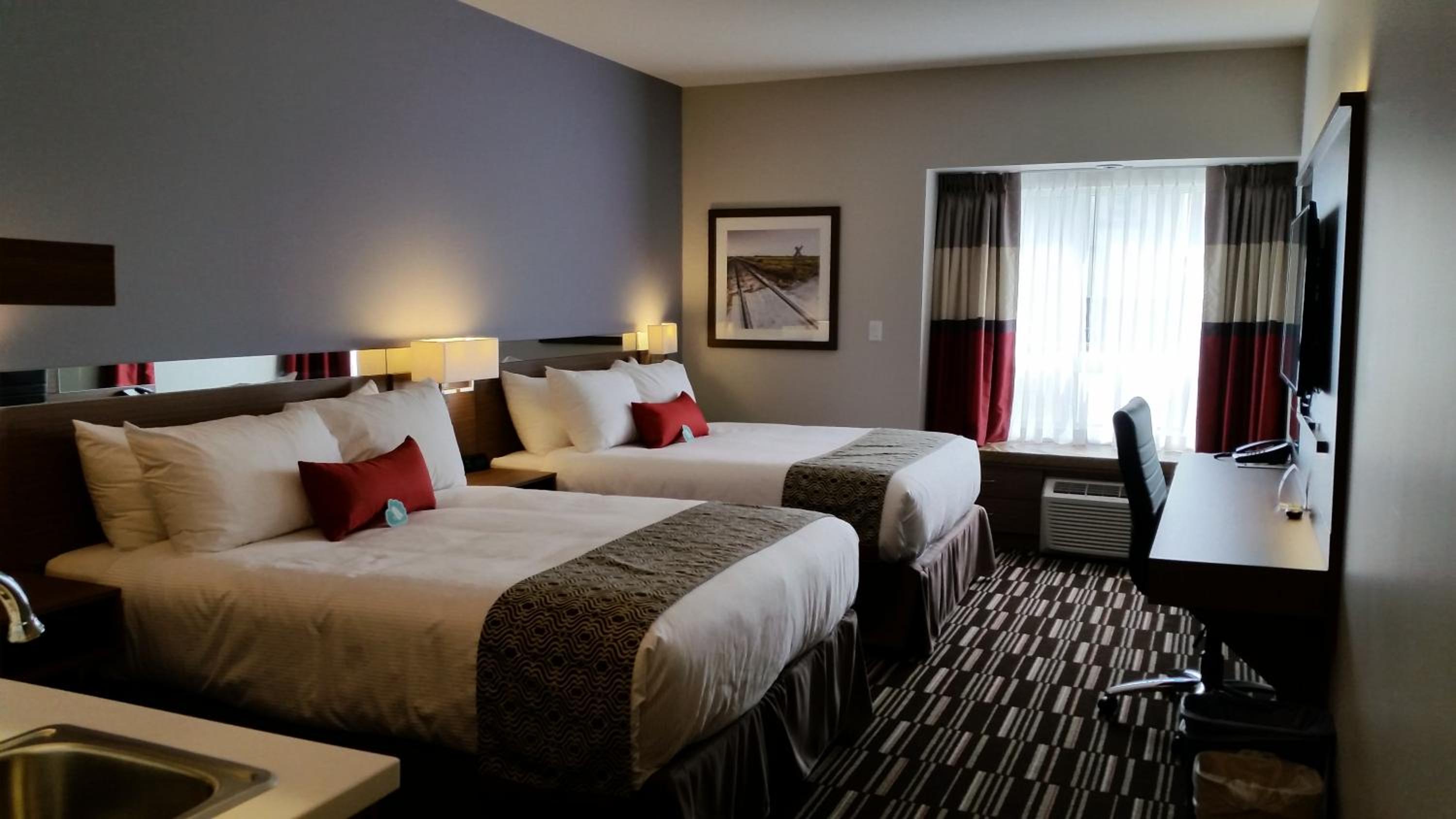 Deluxe Queen Room with Two Queen Beds - Non-Smoking photo 1