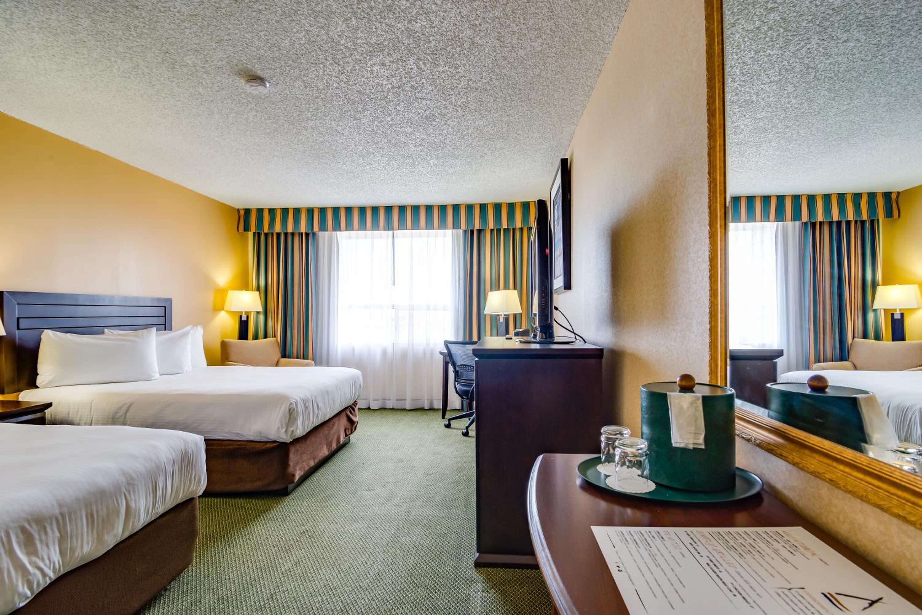 Standard Queen Room with Two Queen Beds - Photo 1