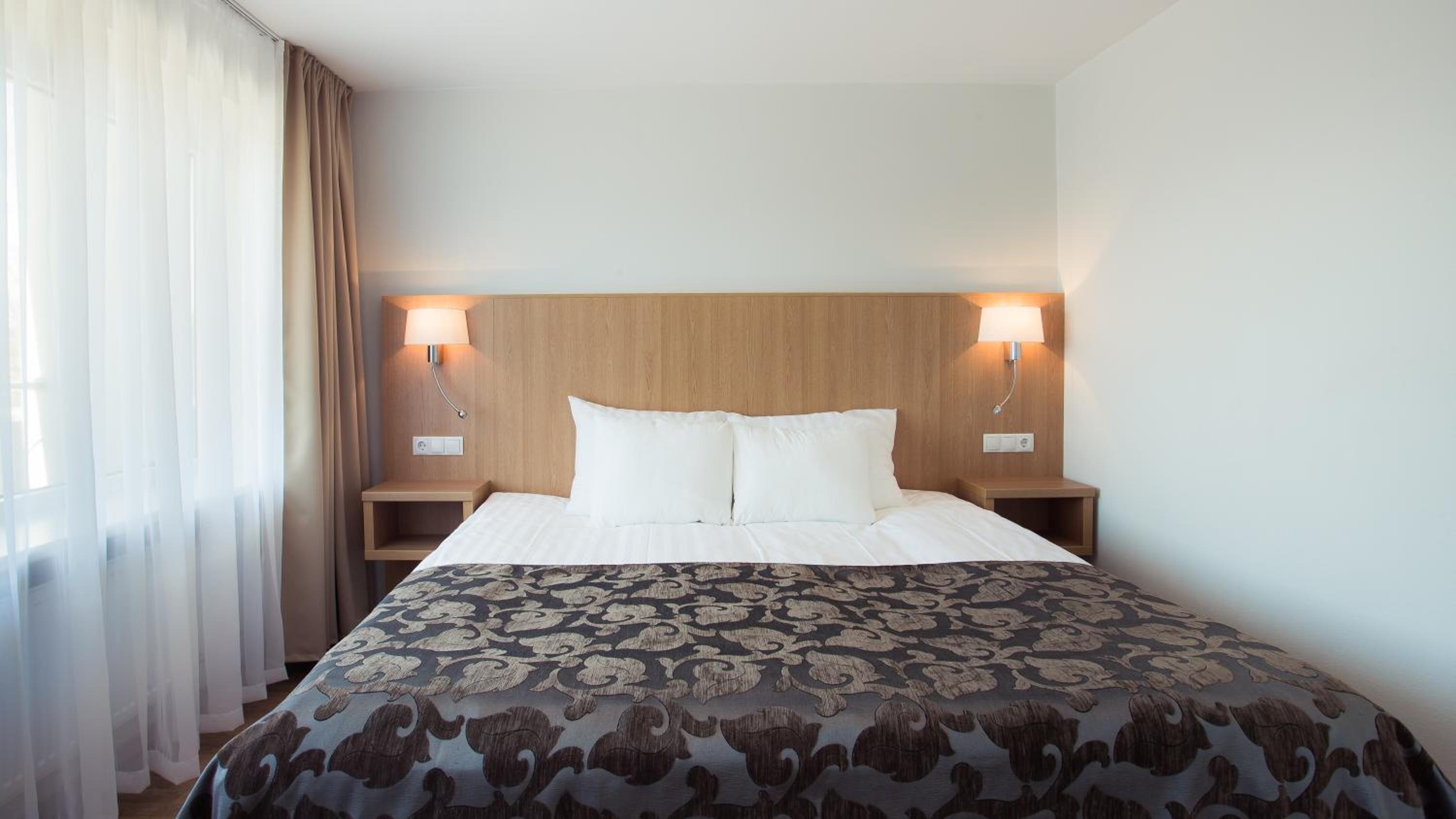 Family Suite (2 Adults + 2 Children) with Balcony and City View