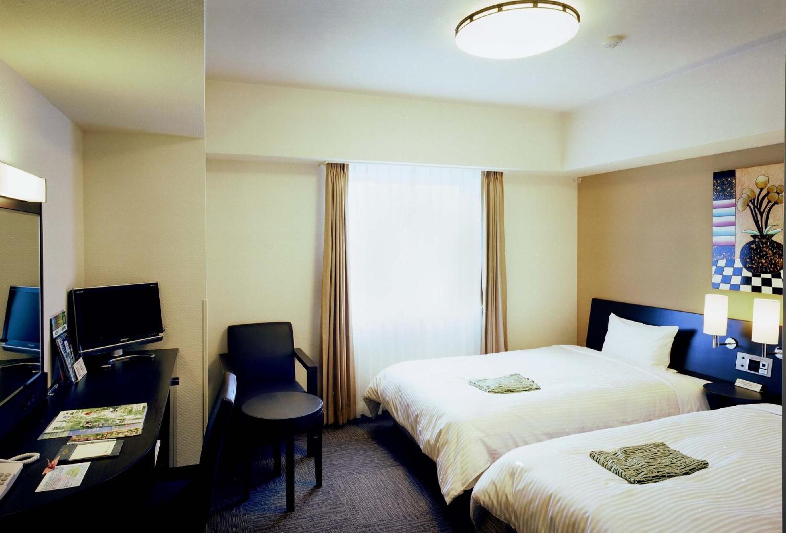 Twin Room - Non-Smoking - Photo 1