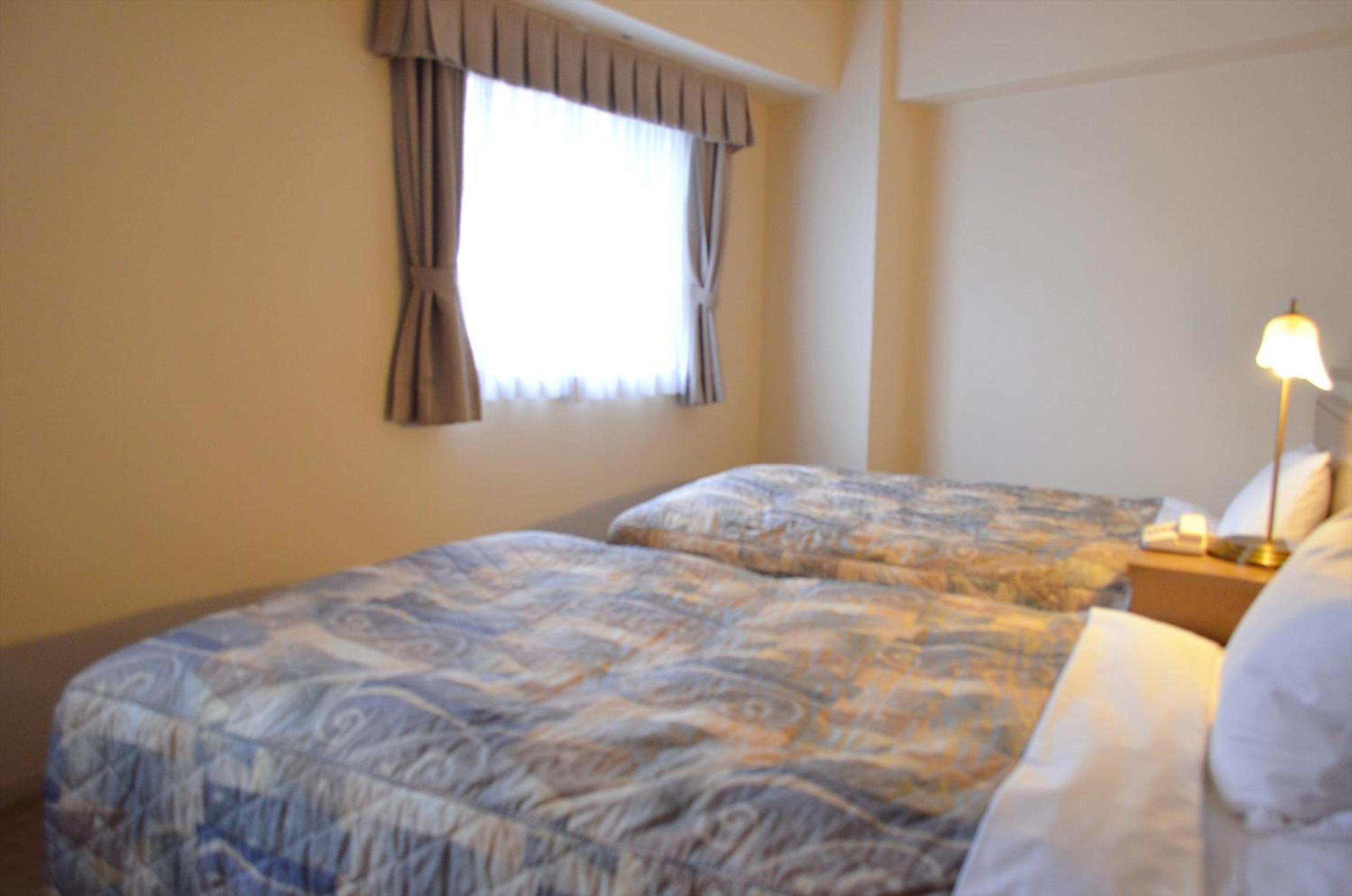 Economy Twin Room - Smoking photo 3