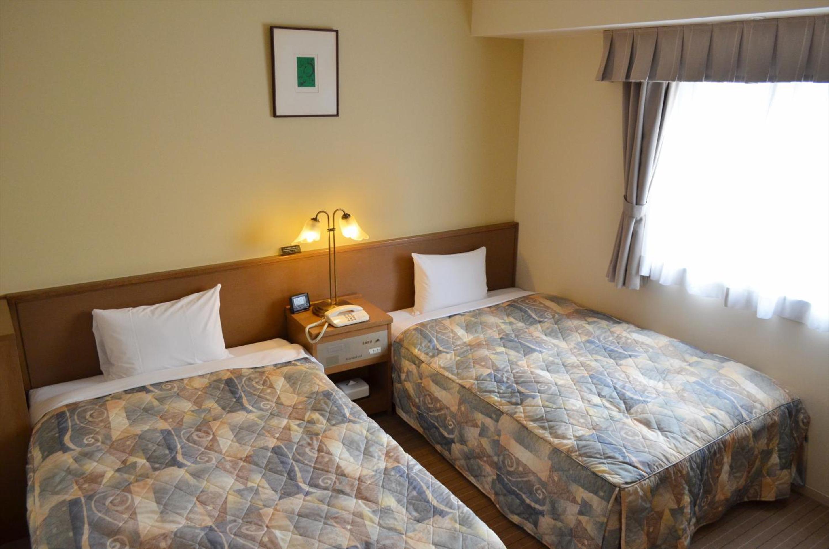 Twin Room - Single Use -Smoking photo 2