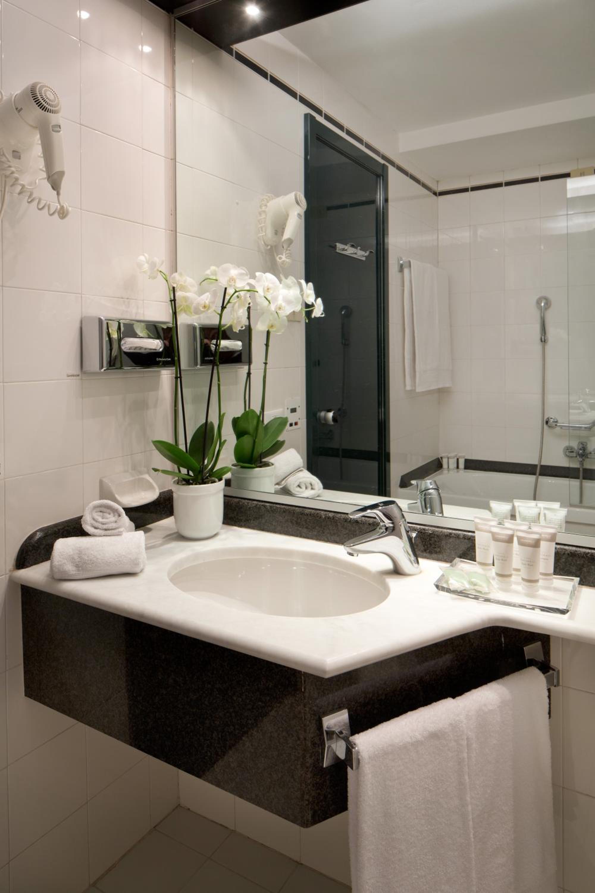 Relax in luxury with our modern bathroom amenities.